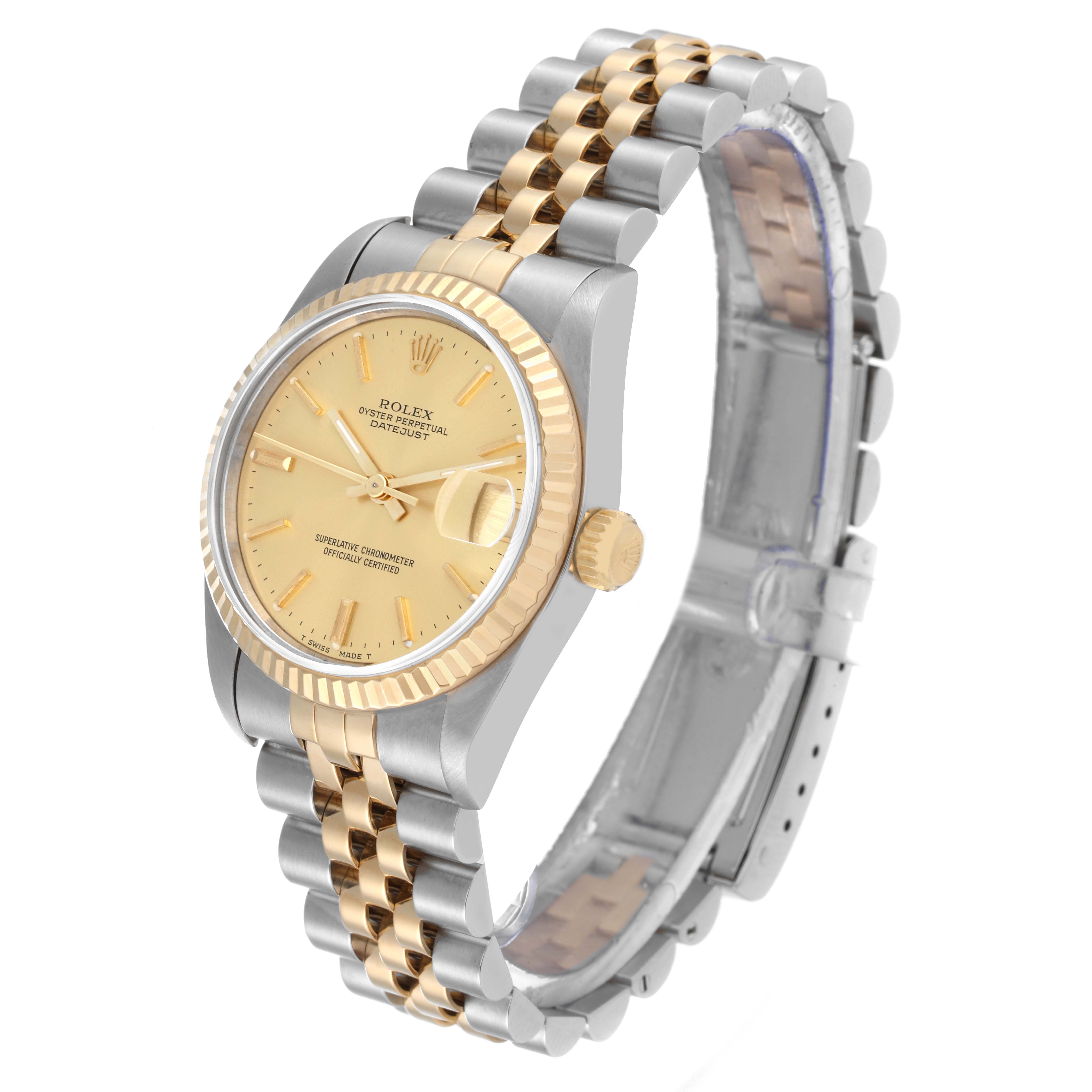 The image shows a Rolex Mid-Size 68273 Women's Steel and Gold (two tone) Champagne Dial 68273 Women's Steel and Gold (two tone) Champagne Dial Datejust watch at an angled view, displaying the face, bezel, crown, and two-tone bracelet.