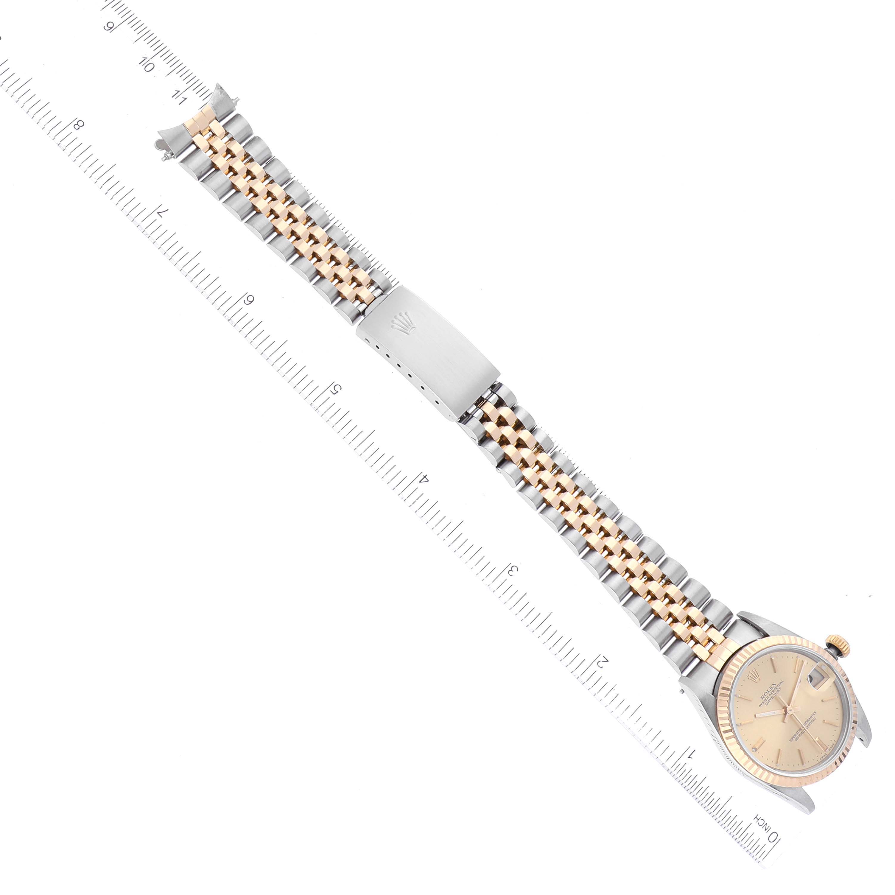The image shows a Rolex Mid-Size 68273 Women's Steel and Gold (two tone) Champagne Dial 68273 Women's Steel and Gold (two tone) Champagne Dial watch laid flat with the face, bracelet, and clasp visible, measured against a ruler.