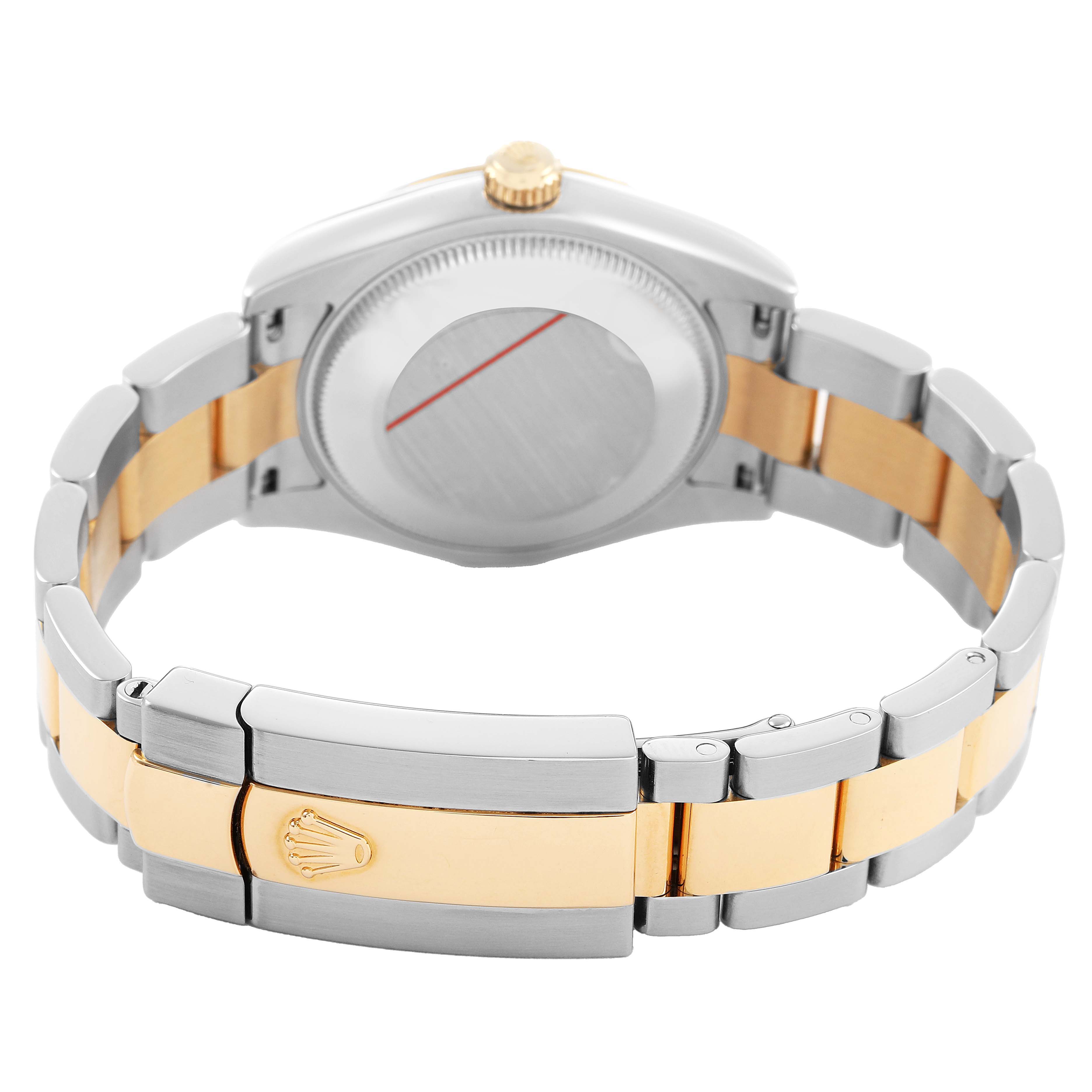 The image shows the back view of a Rolex Datejust 178273 Women's Steel and Gold (two tone) Champagne Dial watch, featuring its clasp and gold and silver bracelet.