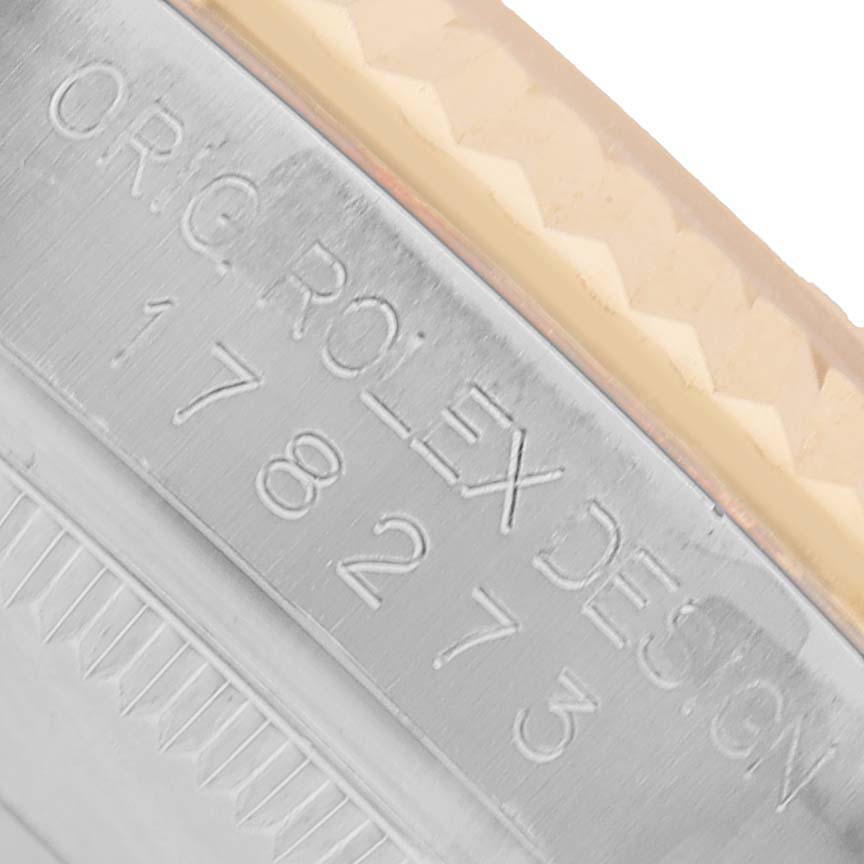 The image shows a close-up of the engraved side of a Rolex Datejust 178273 Women's Steel and Gold (two tone) Champagne Dial, displaying model information.
