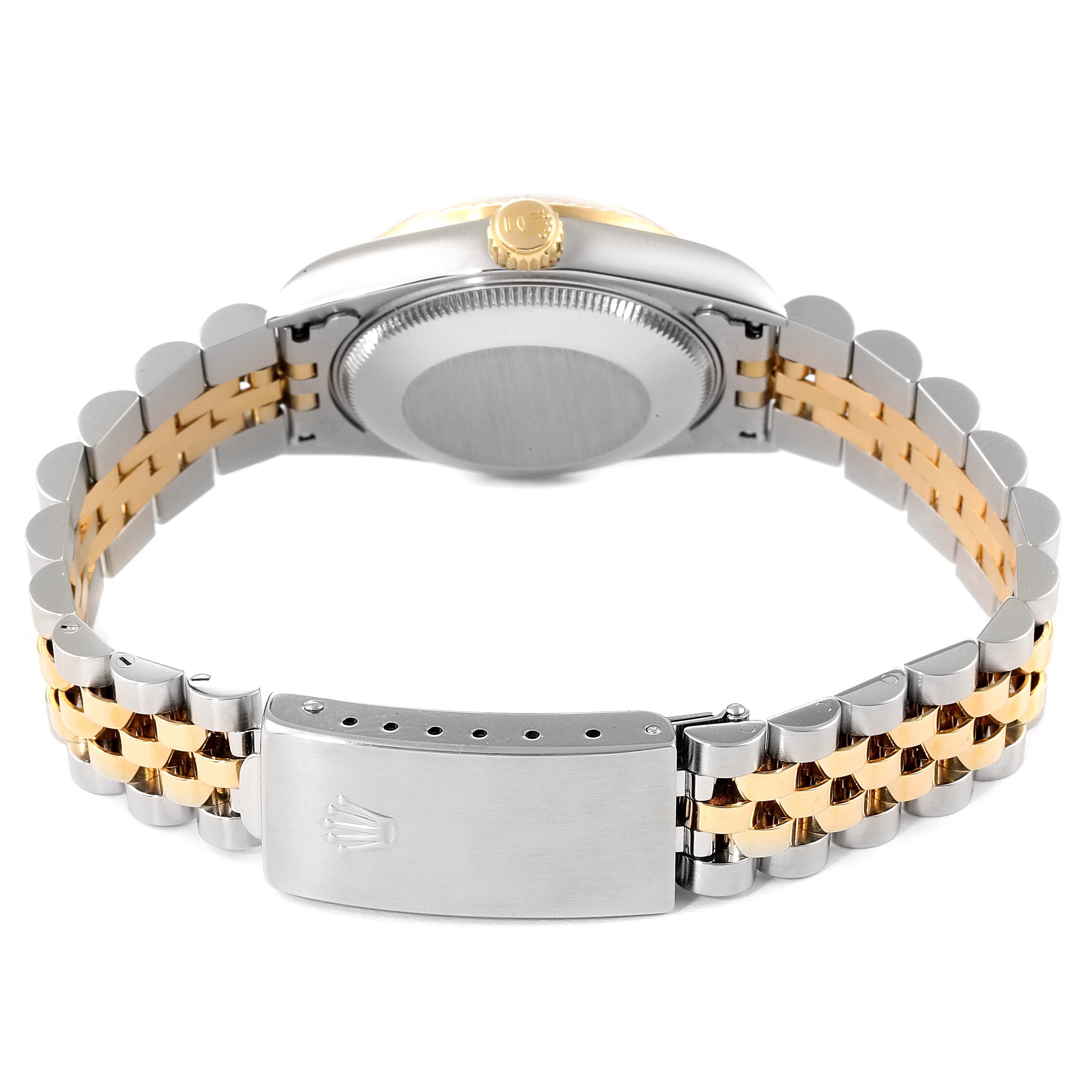 The image shows the back view of a Rolex Mid-Size 68273 Women's Steel and Gold (two tone) Mother of Pearl Dial 68273 Women's Steel and Gold (two tone) Mother of Pearl Dial watch, highlighting the case back, crown, and bi-metal bracelet with a clasp.