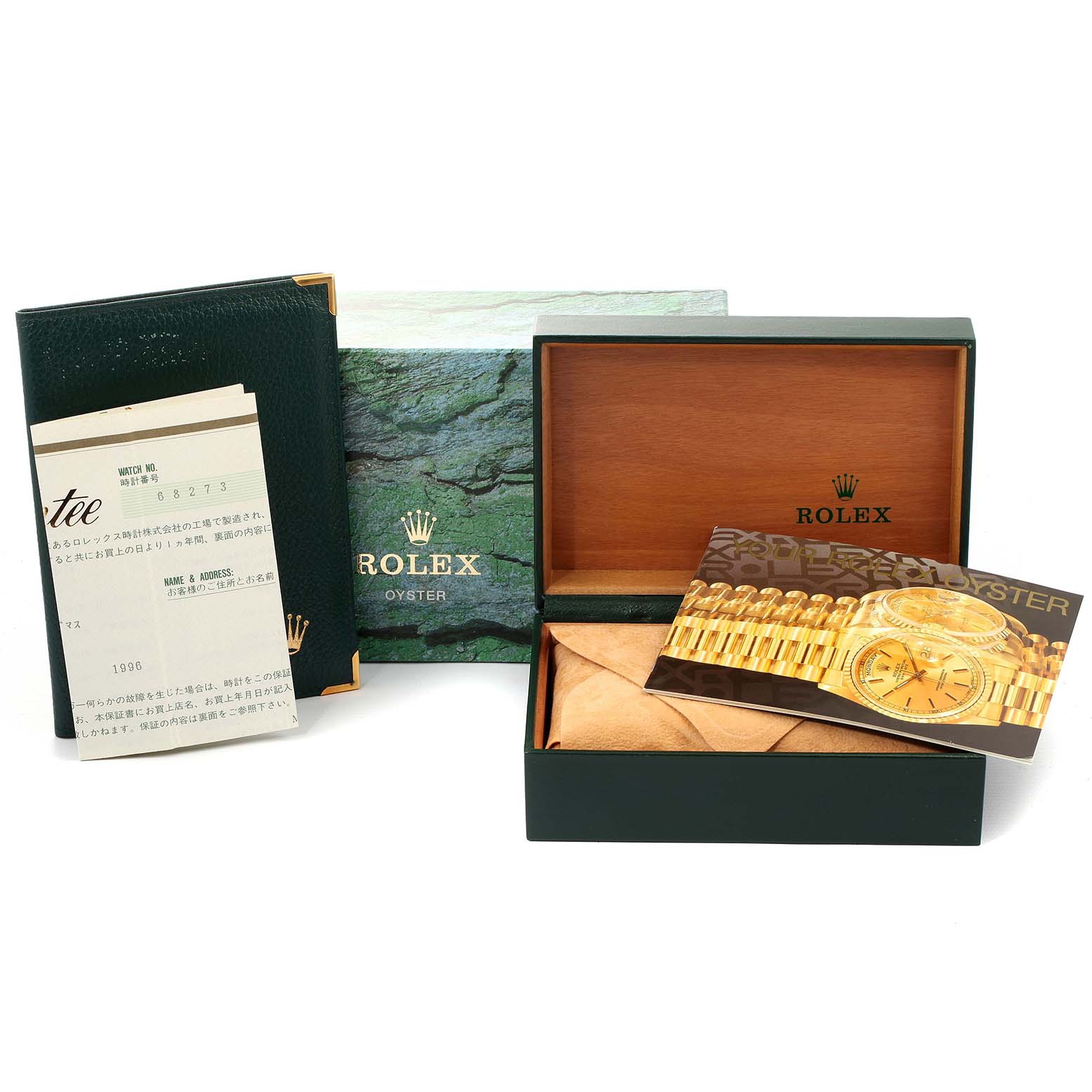 This image shows the packaging, booklet, and accessories for a Rolex Mid-Size 68273 Women's Steel and Gold (two tone) Mother of Pearl Dial 68273 Women's Steel and Gold (two tone) Mother of Pearl Dial model watch, including the box and paperwork.