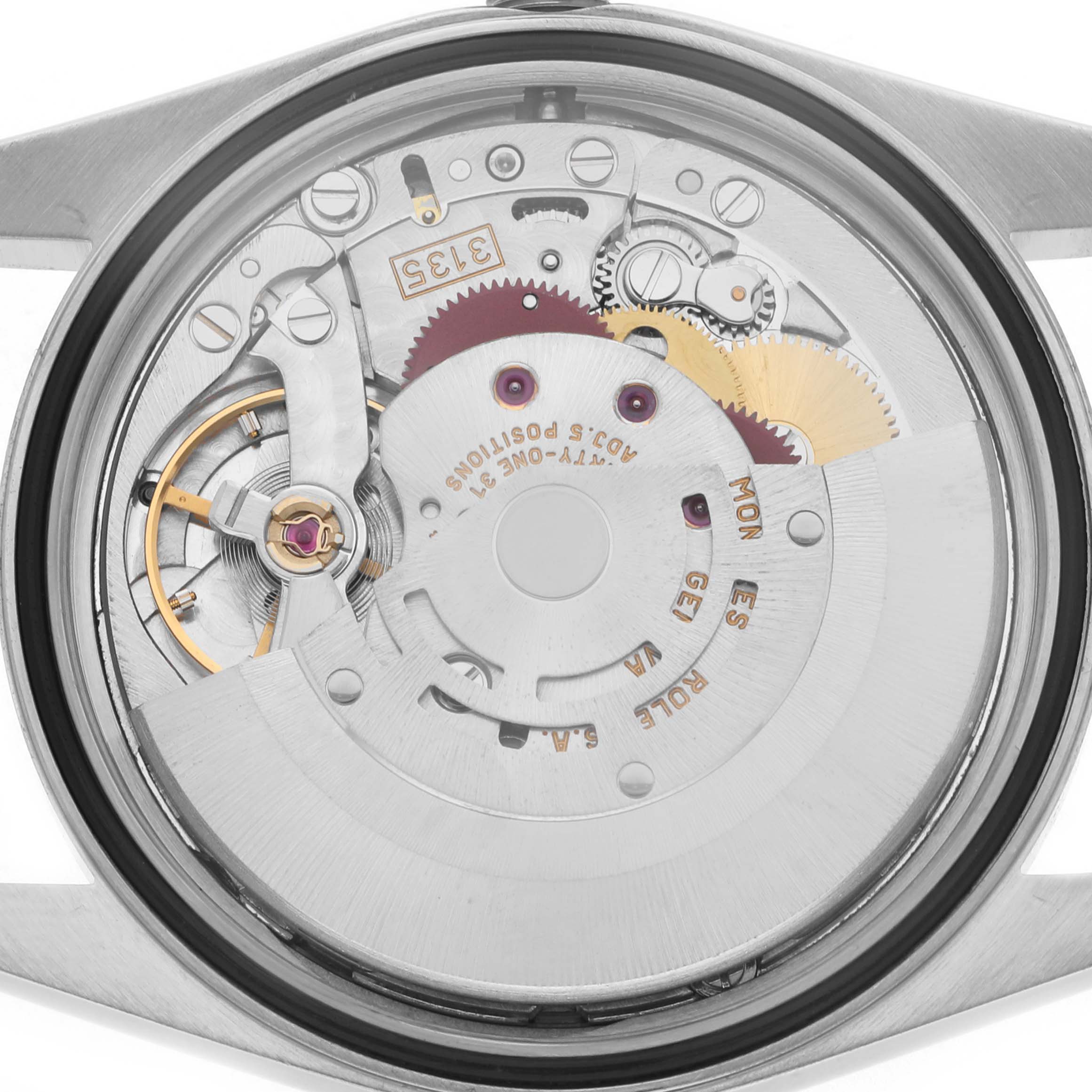 The image shows the back view of a Rolex Datejust 16200 Men
s Stainless Steel Silver Dial 16200 Men
s Stainless Steel Silver Dial, revealing its intricate movement and internal components.