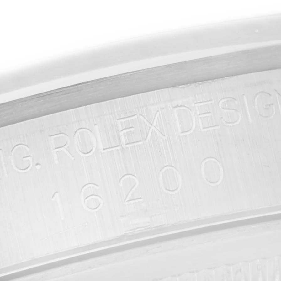 The image shows a close-up of the inner case engraving on a Rolex Datejust 16200 Men
s Stainless Steel Silver Dial 16200 Men
s Stainless Steel Silver Dial, displaying the model number.