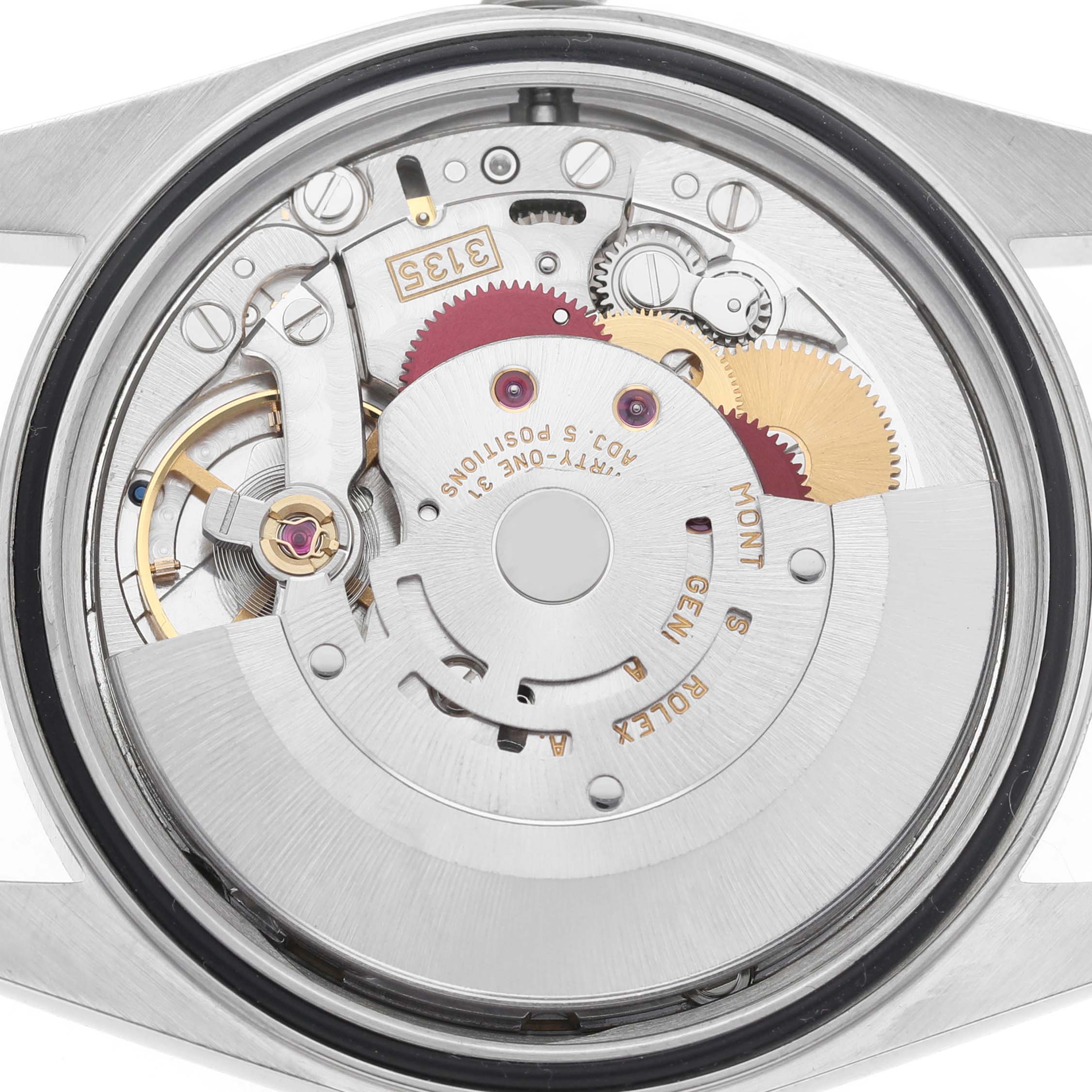 The image shows the movement mechanism of a Rolex Datejust 16233 Men's Steel and Gold (two tone) Blue Dial model from a top view, highlighting its intricate gears and components.