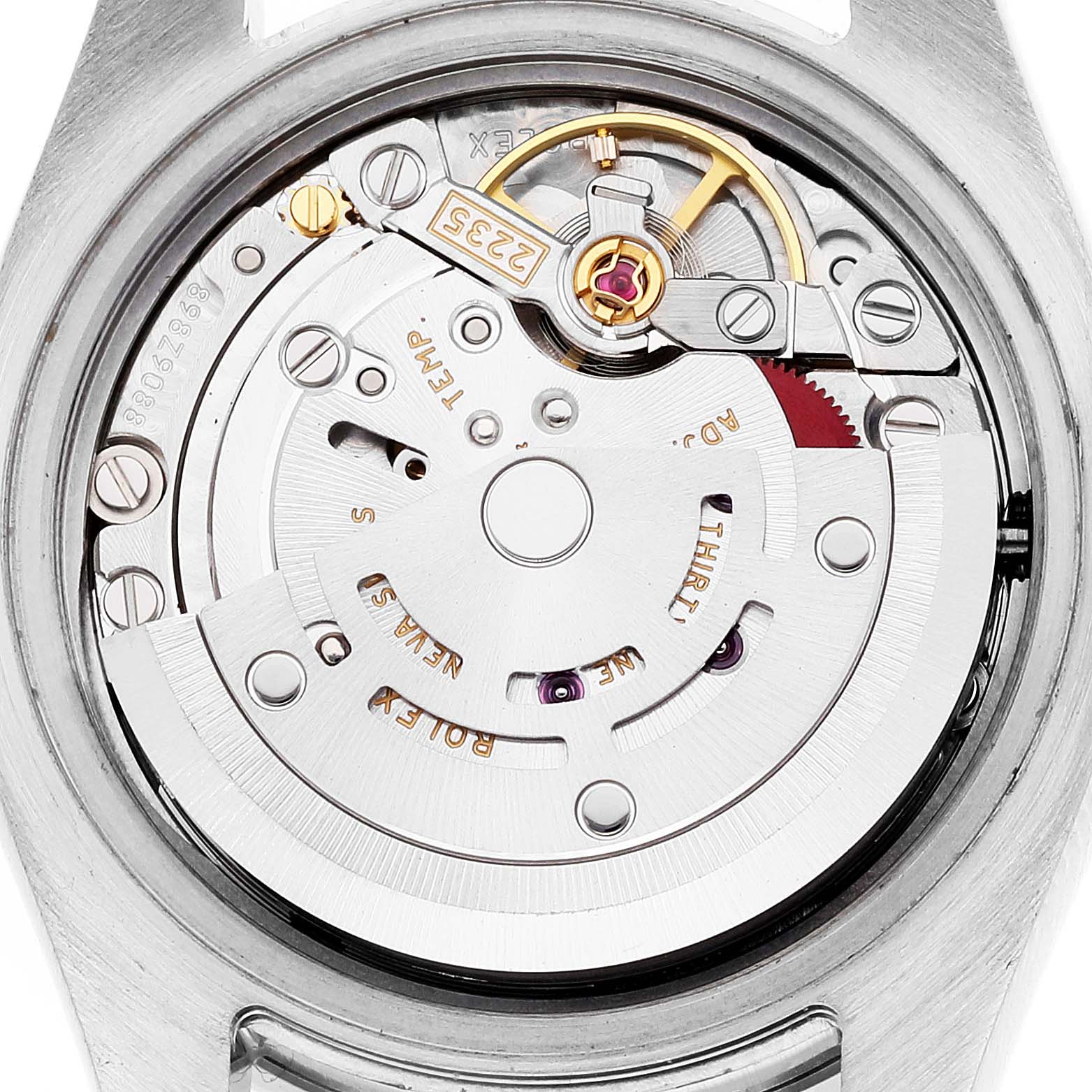 This is a close-up view of the movement mechanism of a Rolex Datejust 179384 Women's Stainless Steel Pink Dial 179384 Women's Stainless Steel Pink Dial watch, showing gears and internal components.