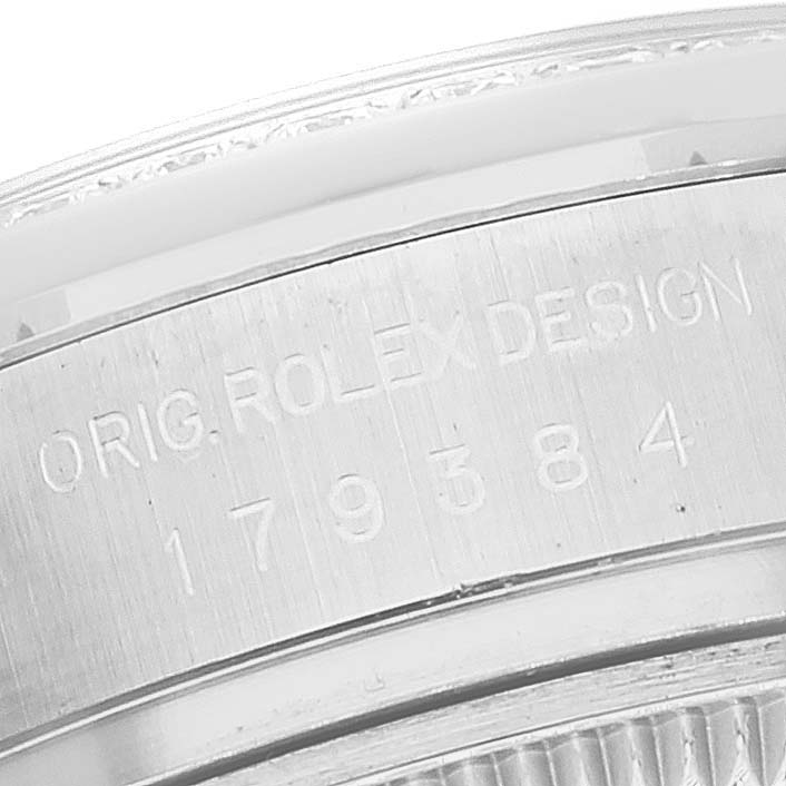 This image shows a close-up of the case back engraving on a Rolex Datejust 179384 Women's Stainless Steel Pink Dial 179384 Women's Stainless Steel Pink Dial watch.