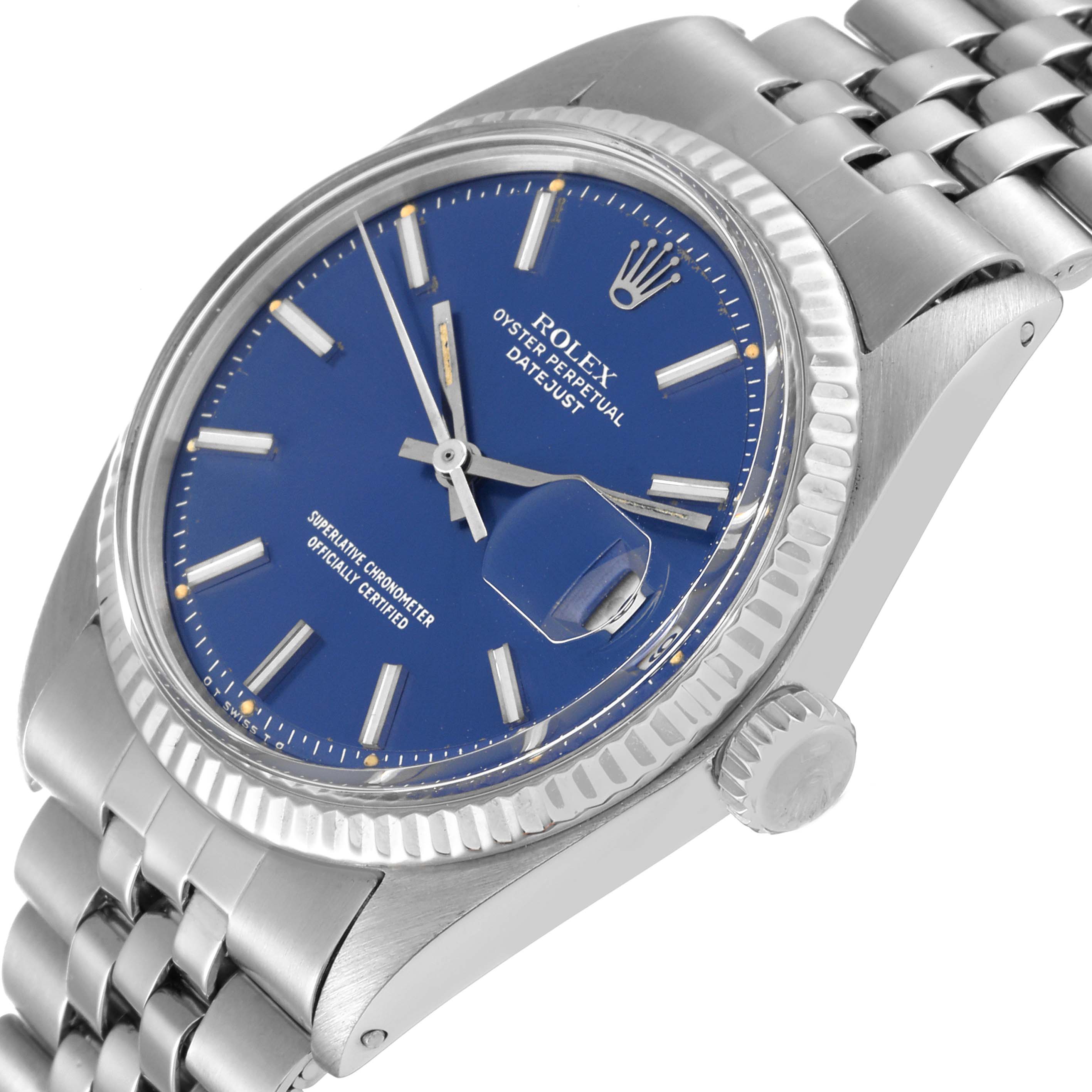 The image shows the Rolex Vintage Collection 1601 Men's Stainless Steel Blue Dial 1601 Men's Stainless Steel Blue Dial Oyster Perpetual Datejust watch at an angle, highlighting its blue dial, fluted bezel, and jubilee bracelet.