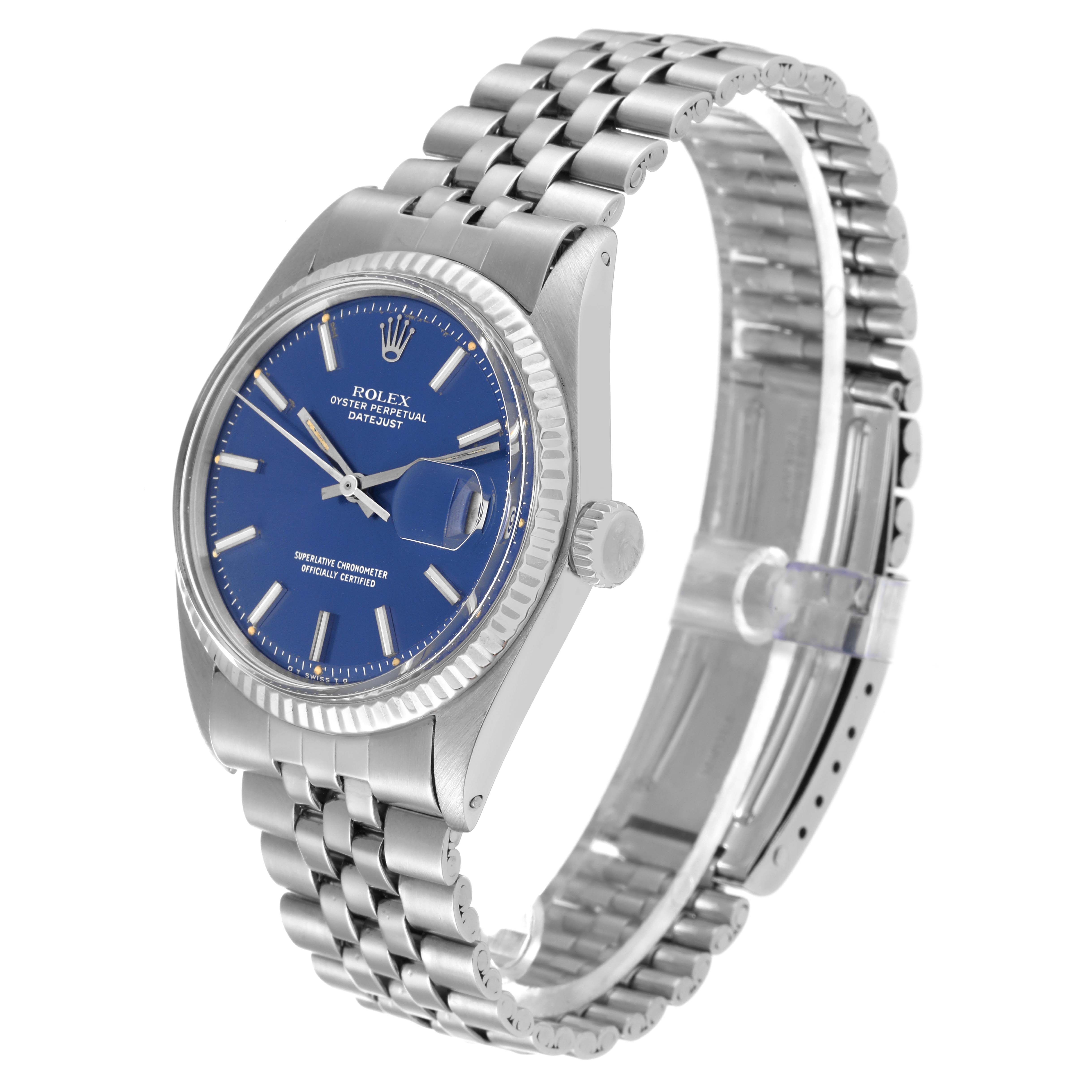 The Rolex Vintage Collection 1601 Men's Stainless Steel Blue Dial 1601 Men's Stainless Steel Blue Dial watch is shown from a side angle displaying its blue dial, fluted bezel, and metal bracelet.