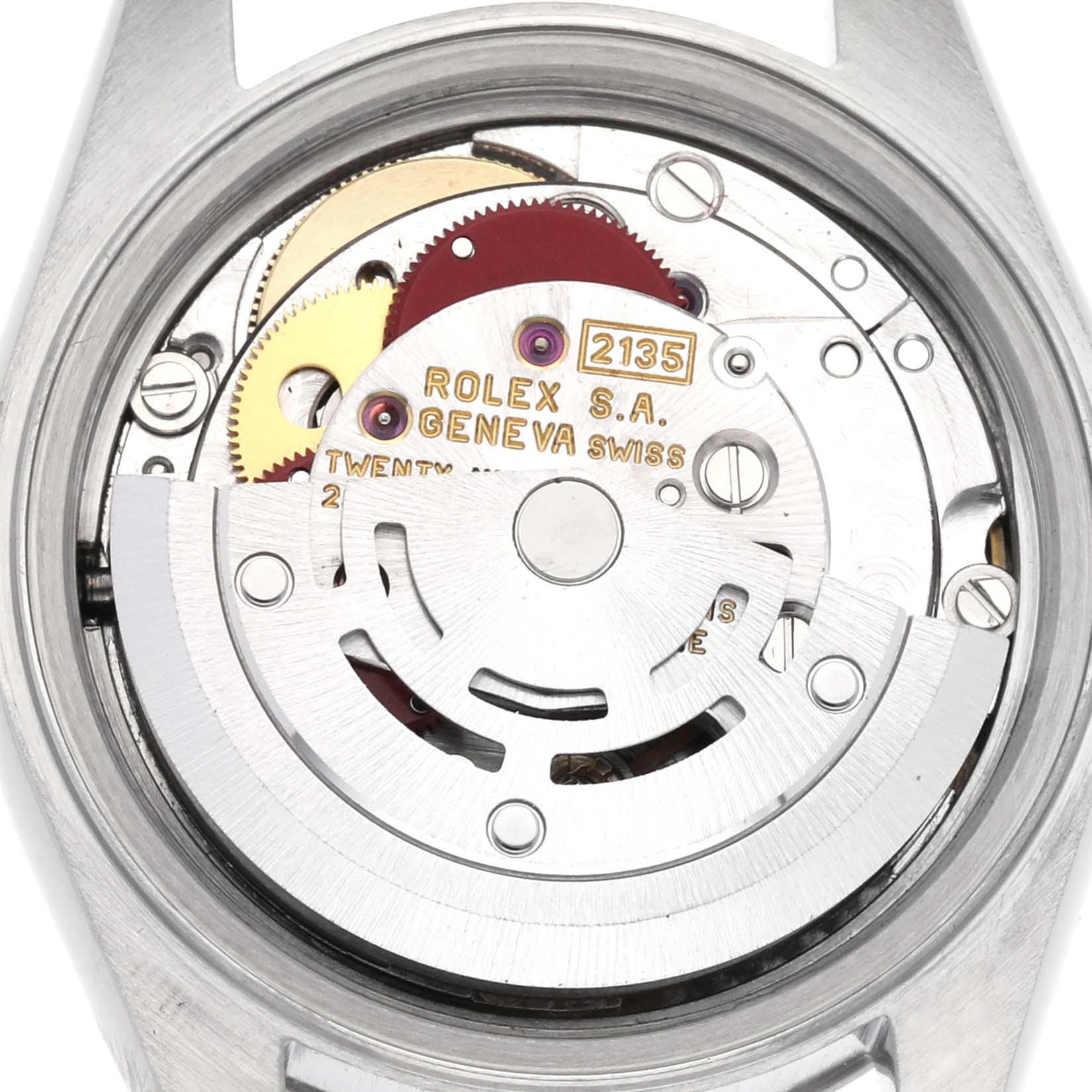 The image shows the movement of a Rolex Datejust 71614 Women
s Stainless Steel Mother of Pearl Dial 71614 Women
s Stainless Steel Mother of Pearl Dial watch from the back, highlighting the gears and rotor.