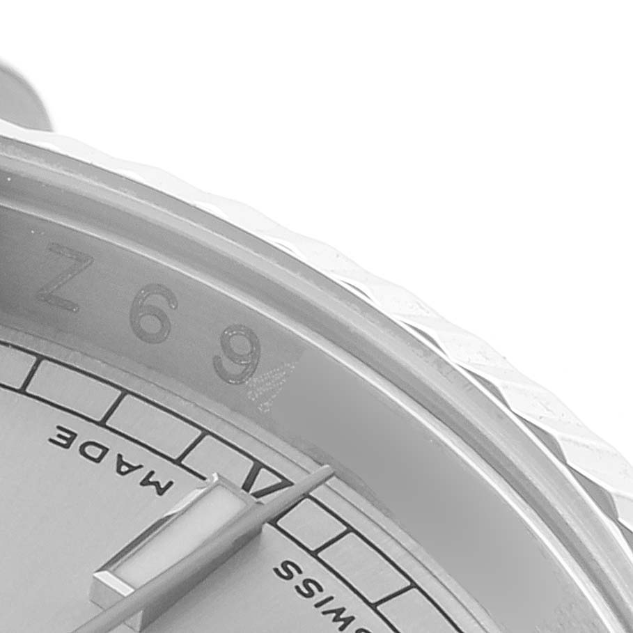 Close-up of the dial and bezel of a Rolex Datejust 116234 Men's Stainless Steel Silver Dial 116234 Men's Stainless Steel Silver Dial watch, focusing on the markers and part of the hand.