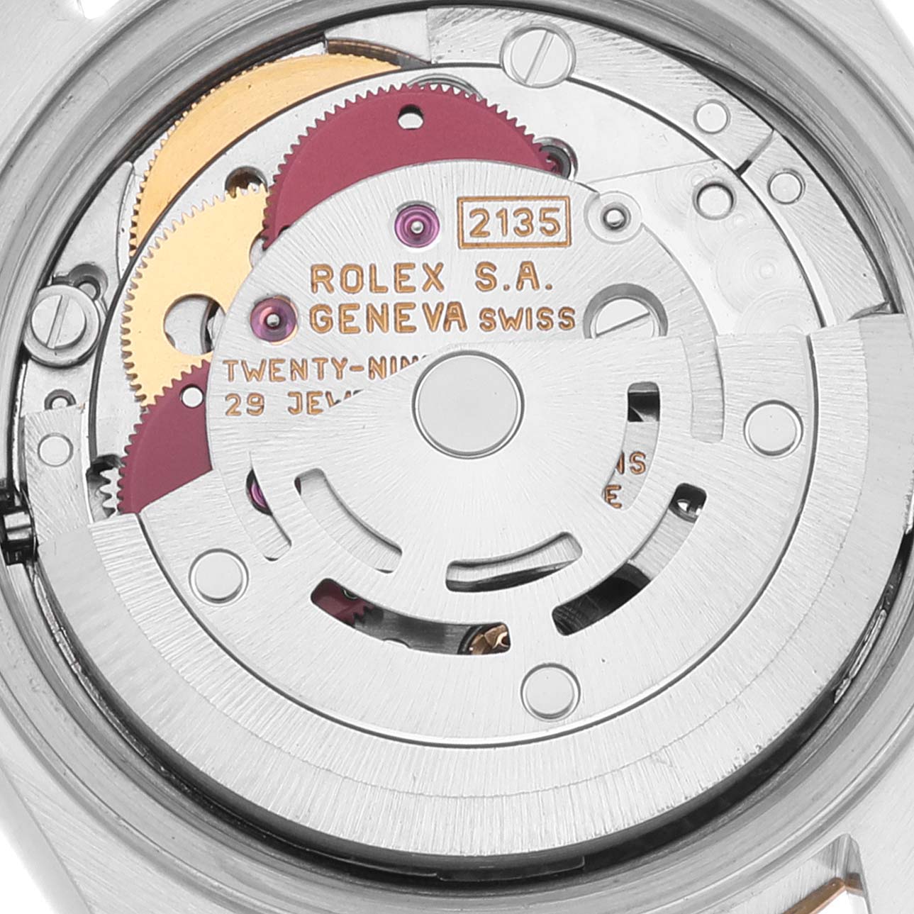 The image shows the intricate internal mechanism and gears of a Rolex Datejust 69173 Women's Steel and Gold (two tone) Beige Dial 69173 Women's Steel and Gold (two tone) Beige Dial watch, viewed from the back.