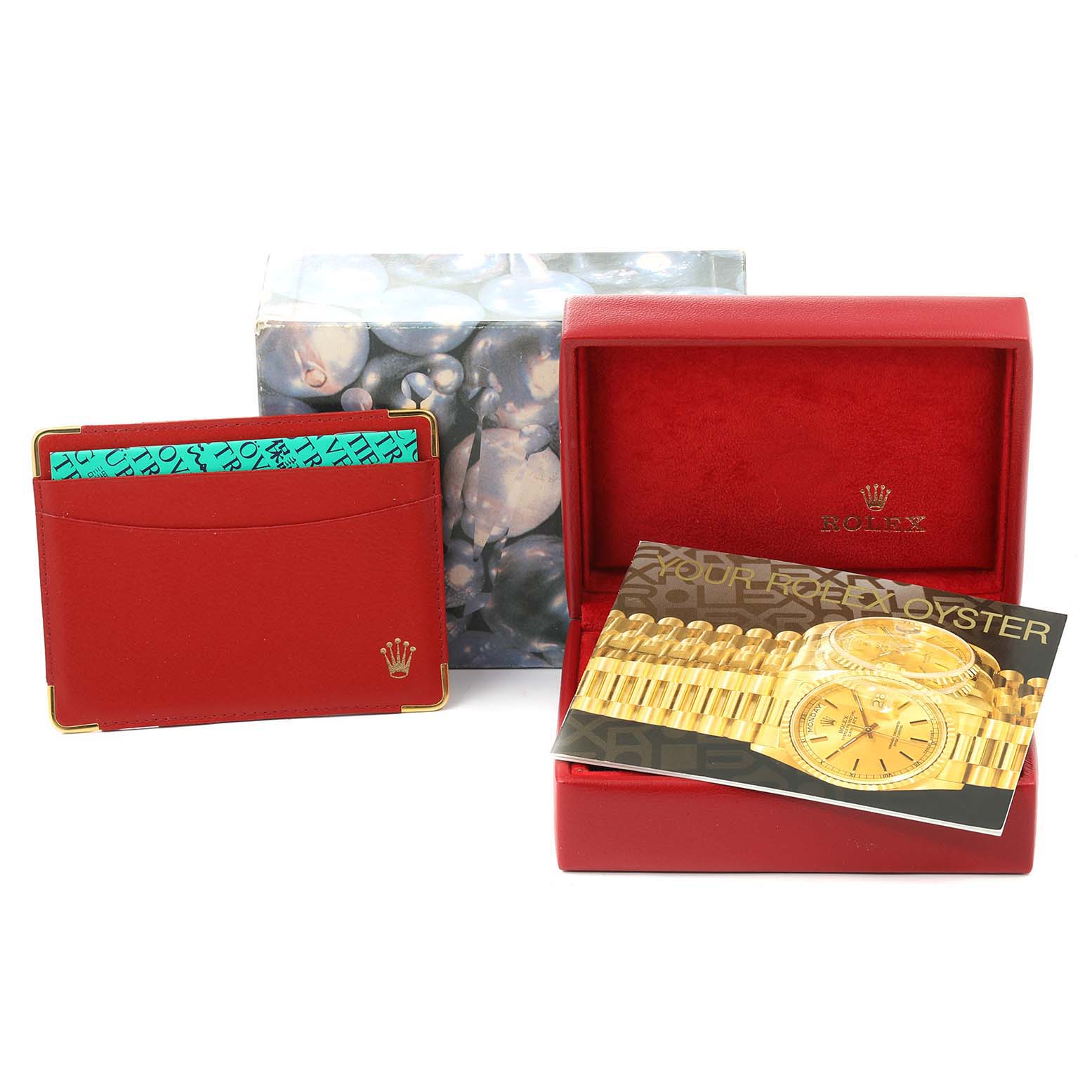 The image shows the box, warranty cardholder, packaging, and manual for a Rolex Datejust 69173 Women's Steel and Gold (two tone) Champagne Dial 69173 Women's Steel and Gold (two tone) Champagne Dial watch.