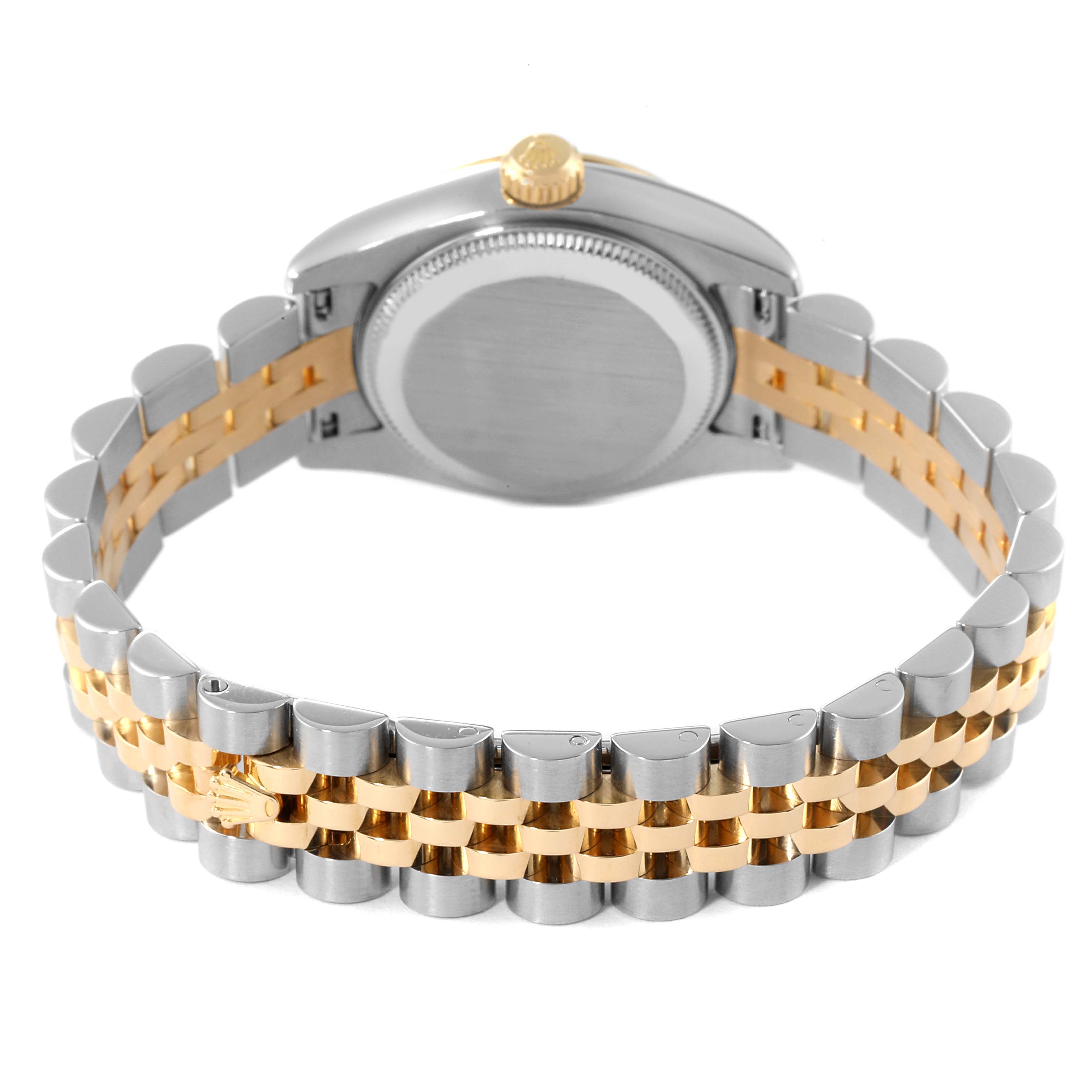 The image shows the back of a Rolex Datejust 179173 Women's Steel and Gold (two tone) Black Dial 179173 Women's Steel and Gold (two tone) Black Dial watch, highlighting the case back and two-tone bracelet with the Rolex logo.