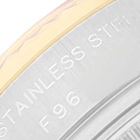 This is a close-up view of the edge of the stainless steel back case on a Rolex Datejust 179173 Women's Steel and Gold (two tone) Black Dial 179173 Women's Steel and Gold (two tone) Black Dial watch.