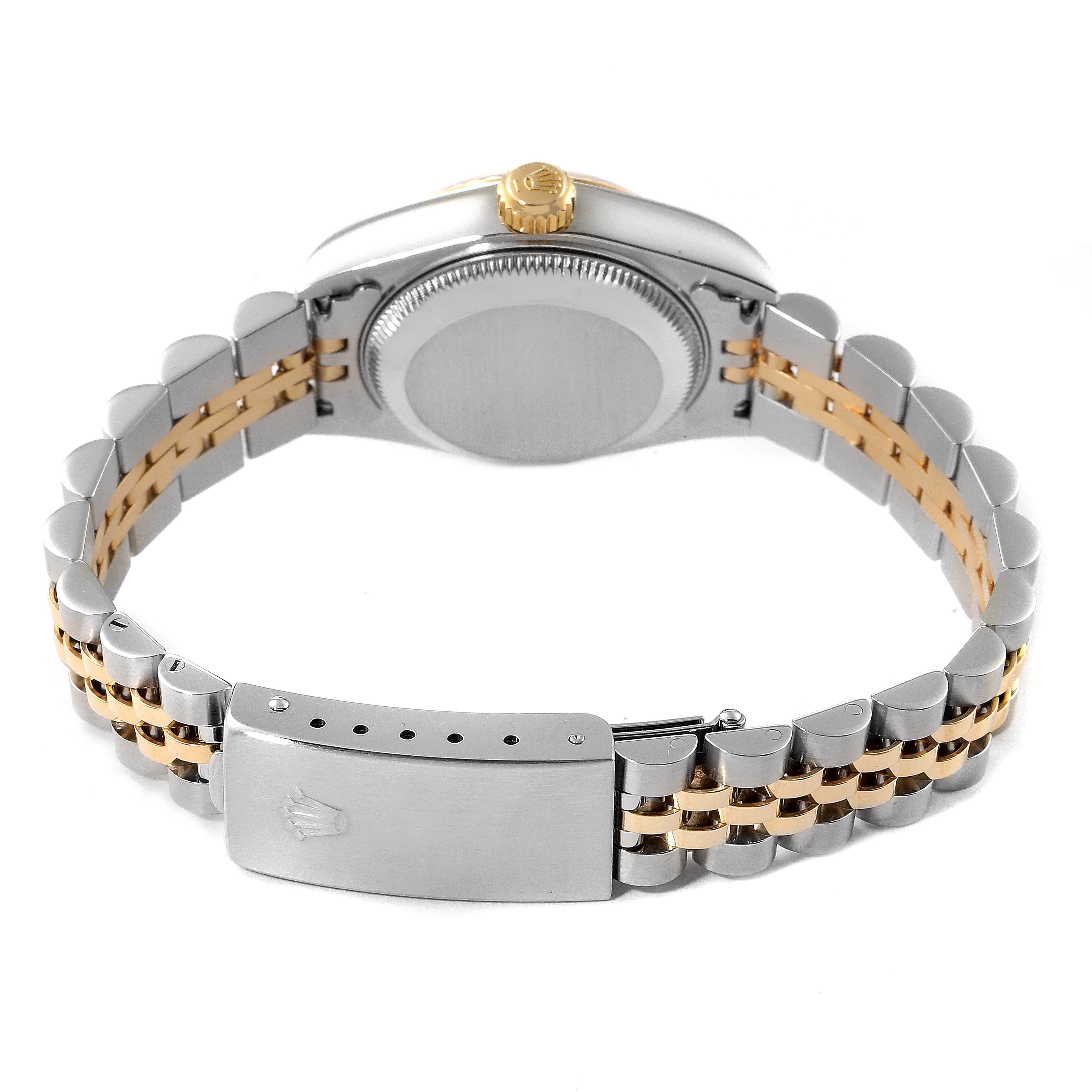 This image shows the back view of a Rolex Datejust 79173 Women
s Steel and Gold (two tone) Champagne Dial 79173 Women
s Steel and Gold (two tone) Champagne Dial watch, including the case back, crown, and two-tone metal bracelet with clasp.