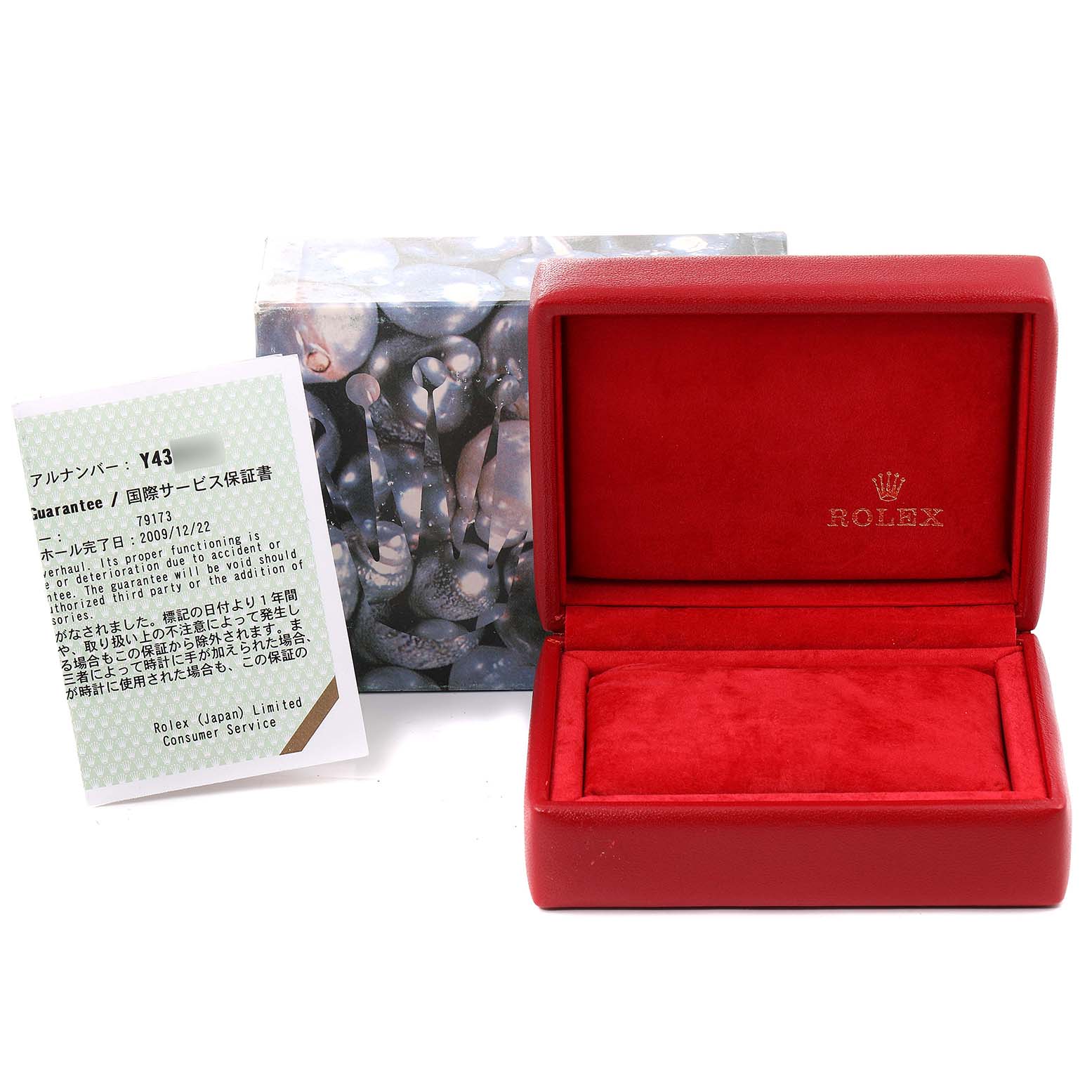 The image shows a Rolex Datejust 79173 Women's Steel and Gold (two tone) Mother of Pearl Dial 79173 Women's Steel and Gold (two tone) Mother of Pearl Dial watch box and warranty card from a front angle.