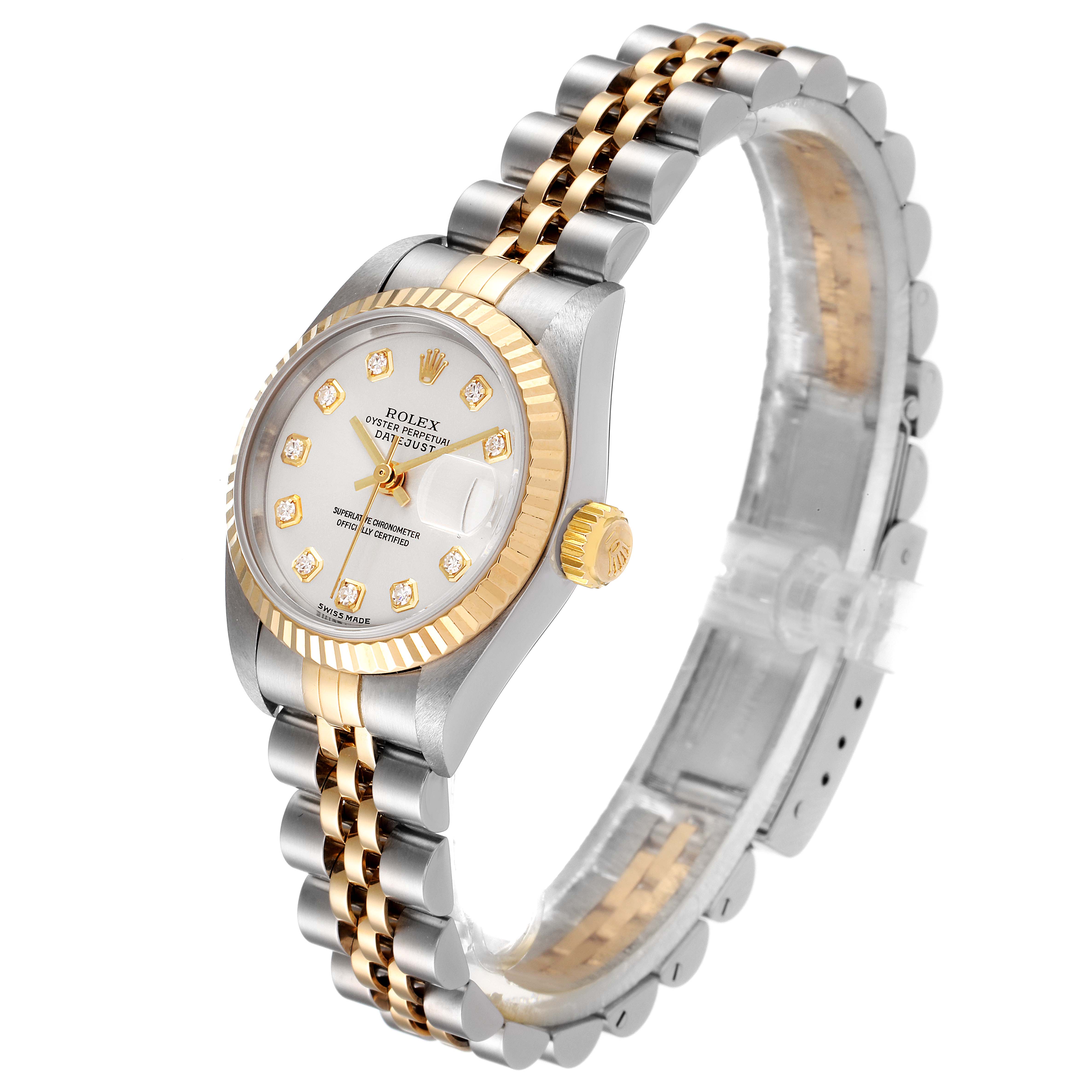 The image shows a Rolex Datejust 79173 Women
s Steel and Gold (two tone) Silver Dial 79173 Women
s Steel and Gold (two tone) Silver Dial watch at an angled side view, highlighting its two-tone bracelet and diamond-set dial.