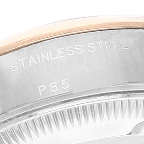 The image shows a close-up of the stainless steel case back and edge of the bezel of a Rolex Datejust 79163 Women's Steel and Gold (two tone) Grey Dial 79163 Women's Steel and Gold (two tone) Grey Dial watch.