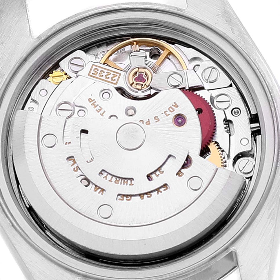 This image shows the movement mechanism and internal parts of a Rolex Datejust 79163 Women's Steel and Gold (two tone) Grey Dial 79163 Women's Steel and Gold (two tone) Grey Dial model watch from a top-down angle.