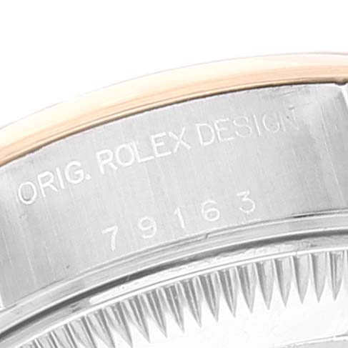 The image shows a close-up of the case side of a Rolex Datejust 79163 Women's Steel and Gold (two tone) Grey Dial 79163 Women's Steel and Gold (two tone) Grey Dial watch, displaying the model number "79163" and engraving.