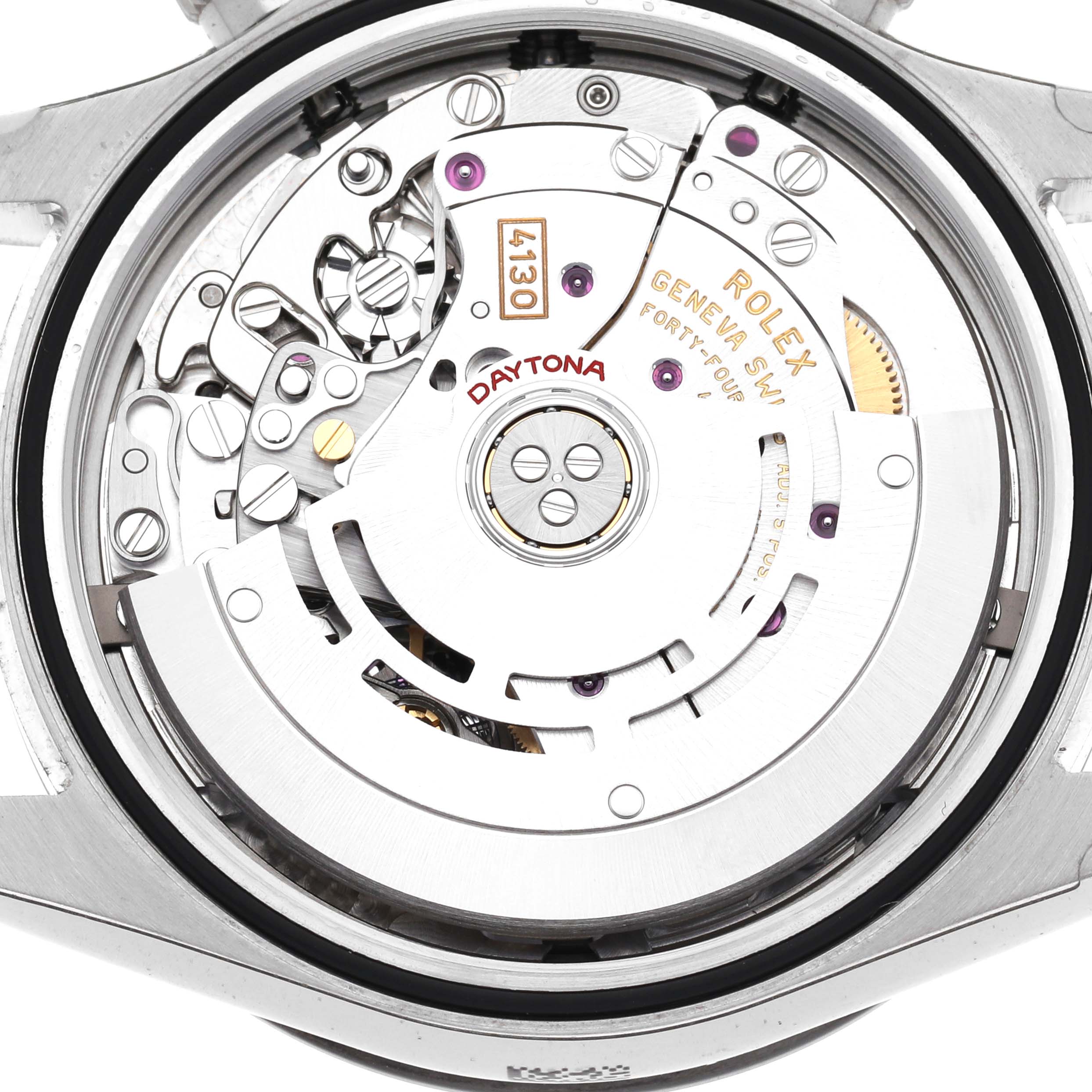 The image shows the movement of a Rolex Daytona 116500LN Men
s Stainless Steel White Dial 116500LN Men
s Stainless Steel White Dial watch from the back, featuring intricate mechanisms and engravings.