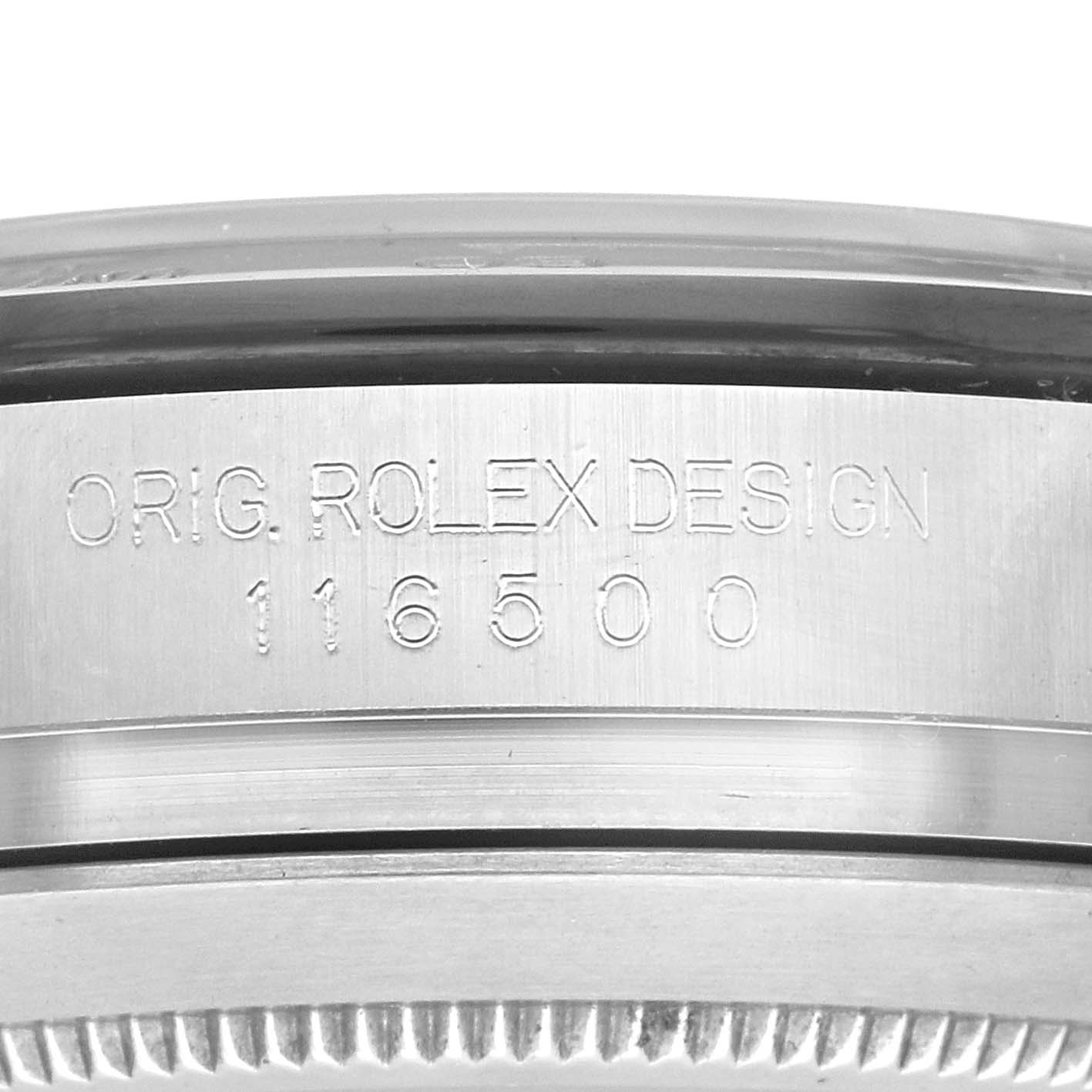 The image shows a close-up of the side of a Rolex Daytona 116500LN Men
s Stainless Steel White Dial 116500LN Men
s Stainless Steel White Dial watch case with the model number 116500 engraved.