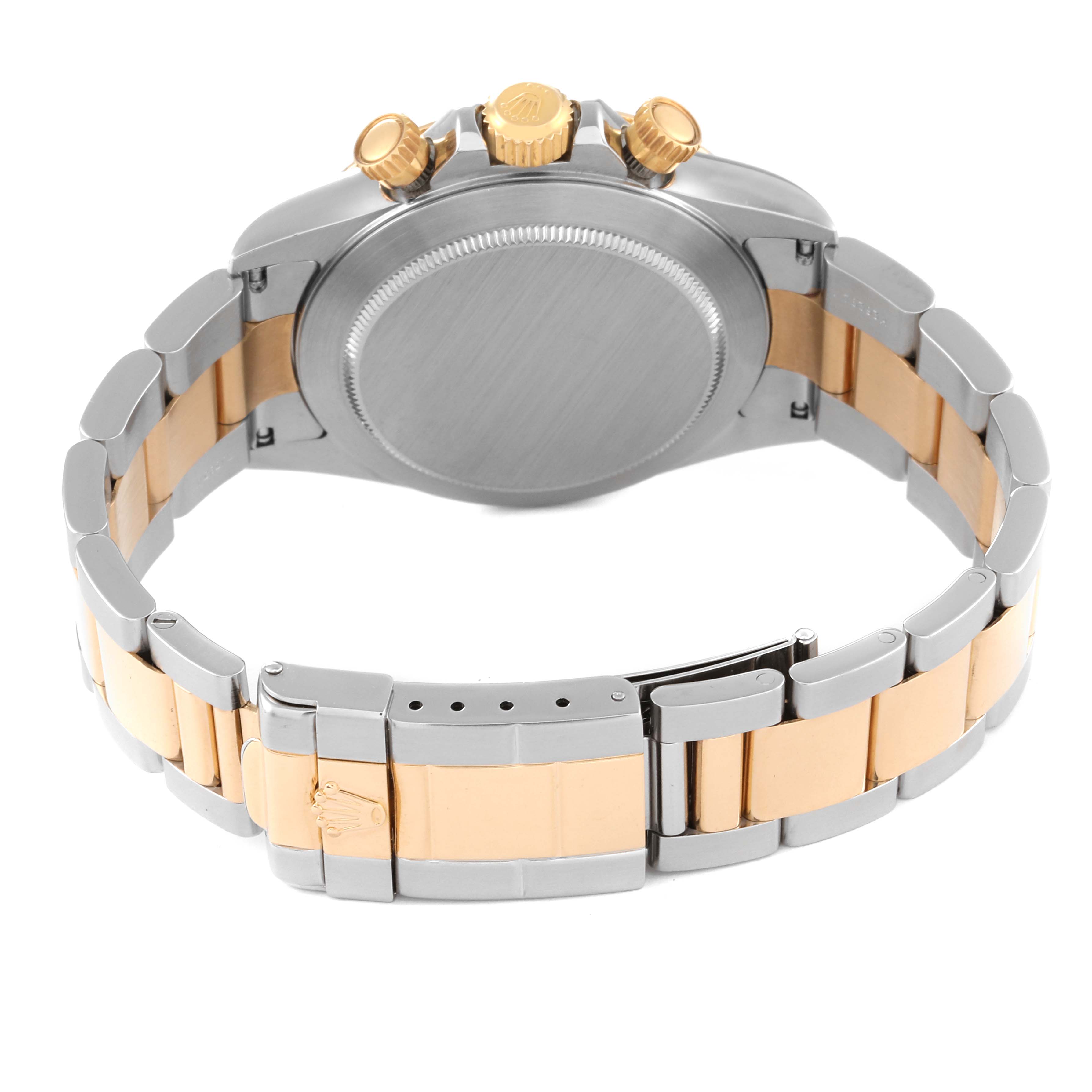 This image shows the back view of a Rolex Daytona 16523 Men
s Steel and Gold (two tone) White Dial 16523 Men
s Steel and Gold (two tone) White Dial watch, featuring the clasp, bracelet, case back, and crown.