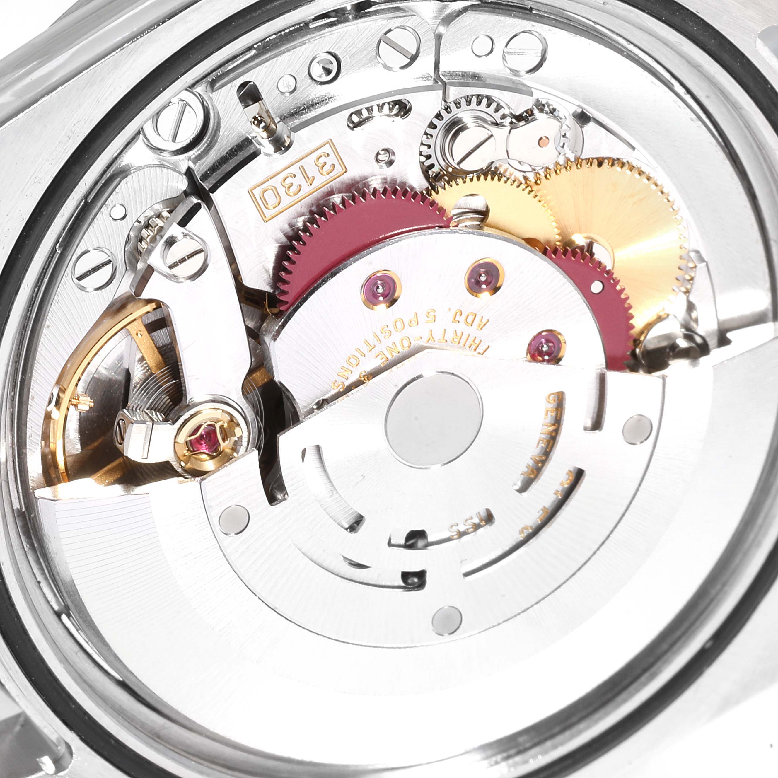 The image shows a close-up, top-down view of the internal mechanism of a Rolex Explorer 114270 Men
s Stainless Steel Black Dial 114270 Men
s Stainless Steel Black Dial watch.
