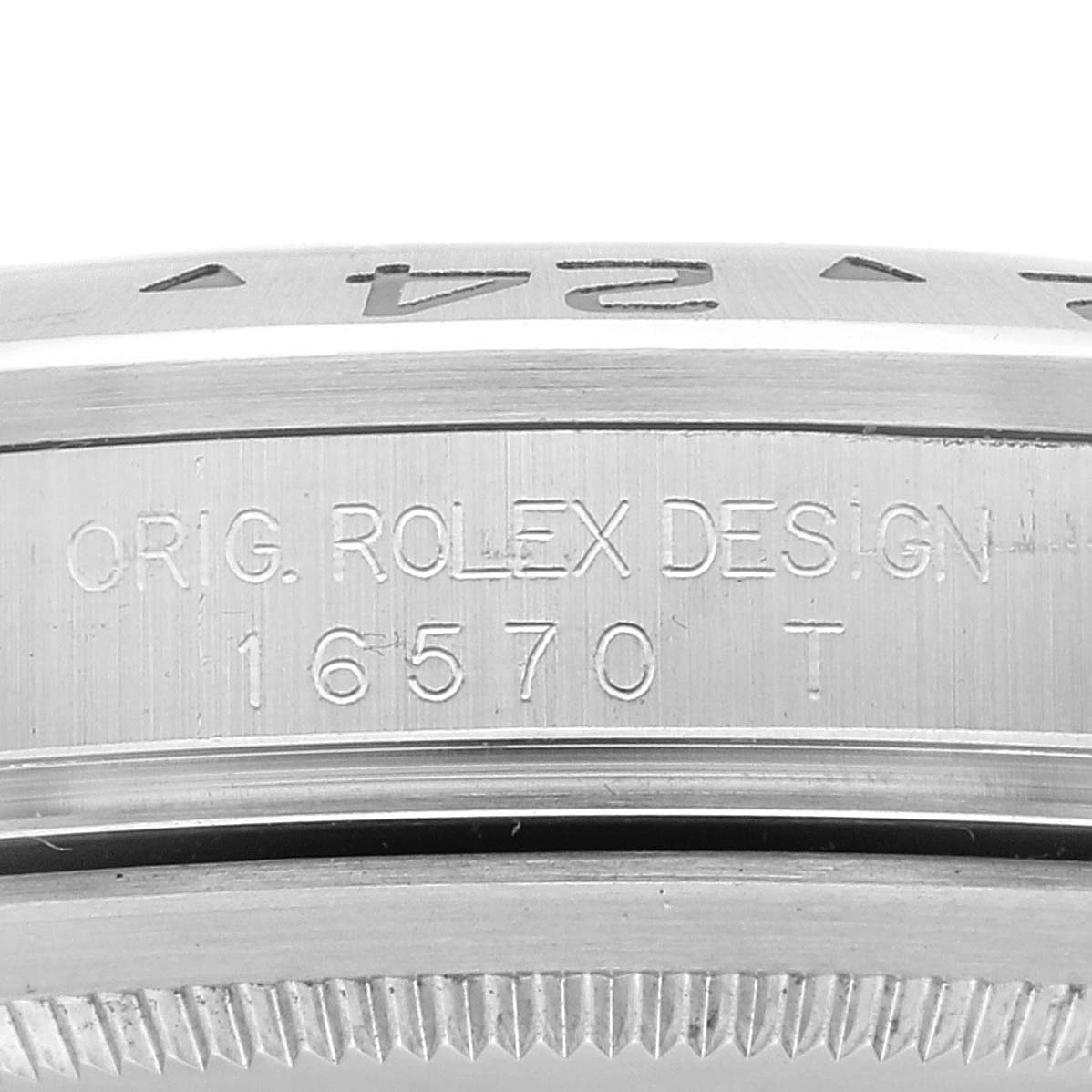 Close-up image of the side of a Rolex Explorer 16570 Men
s Stainless Steel White Dial 16570 Men
s Stainless Steel White Dial watch, showing the model number 16570 and the engraving "ORIG. ROLEX DESIGN".