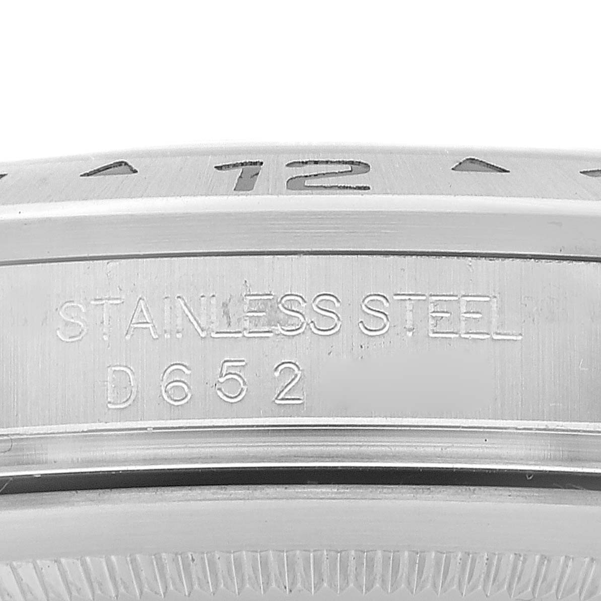 This image shows a close-up view of the stainless steel case back of the Rolex Explorer 16570 Men
s Stainless Steel White Dial 16570 Men
s Stainless Steel White Dial watch, featuring the inscribed model detail.