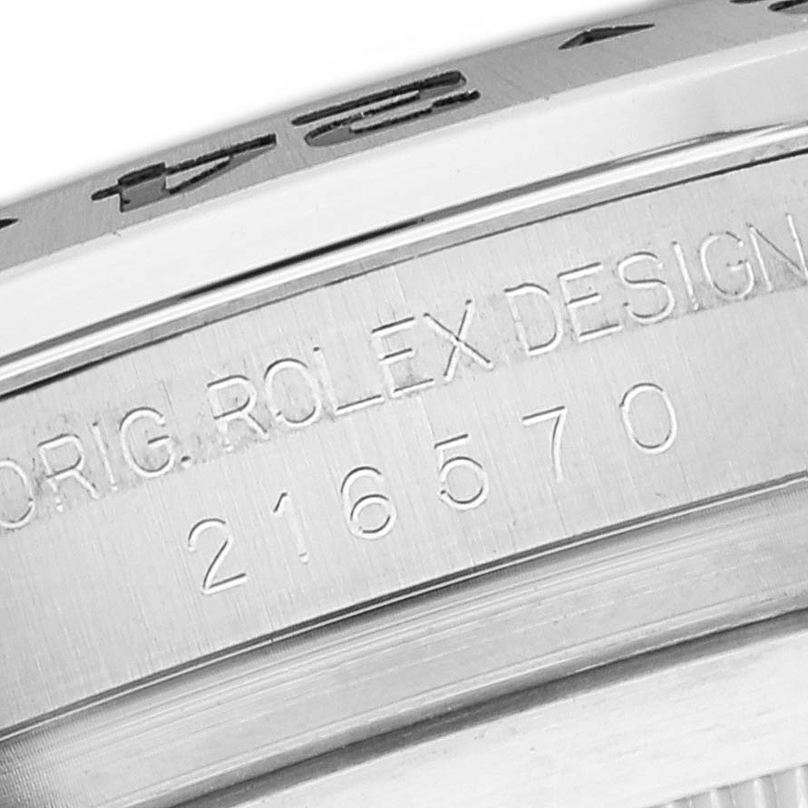 The image shows a close-up of the bezel and case side of a Rolex Explorer 216570 Men
s Stainless Steel Black Dial 216570 Men
s Stainless Steel Black Dial watch model 216570.
