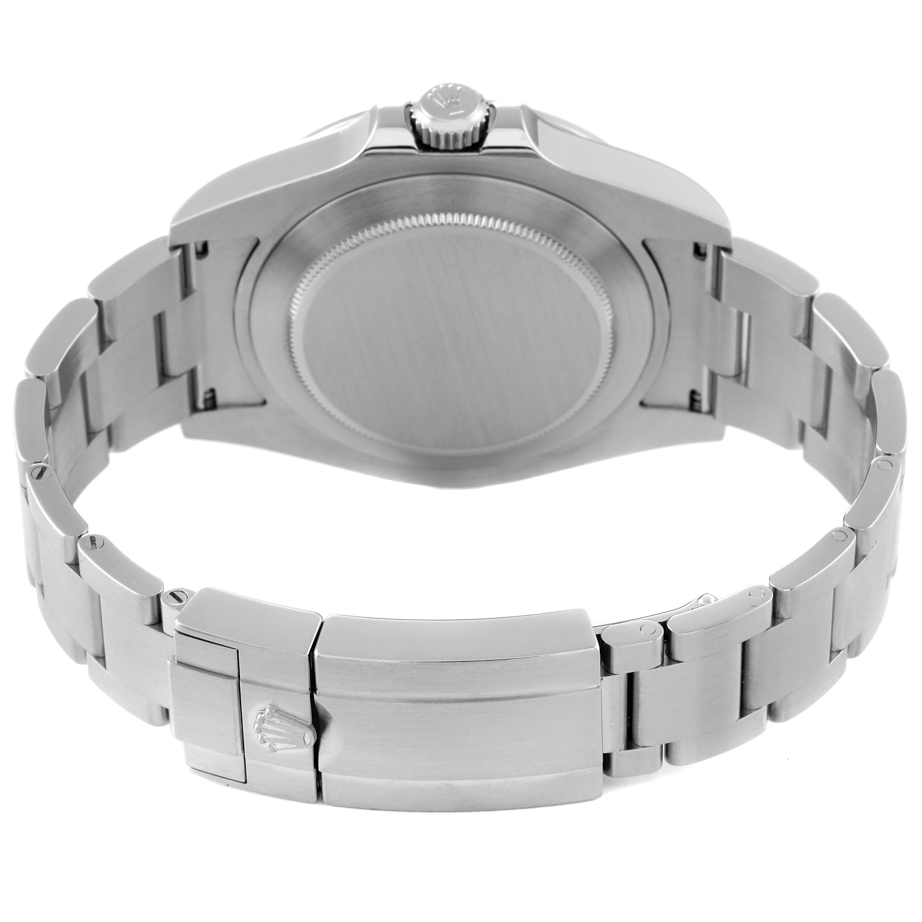 The Rolex Explorer 216570 Men
s Stainless Steel Black Dial 216570 Men
s Stainless Steel Black Dial watch is shown from the back, highlighting the case back, crown, and bracelet clasp.