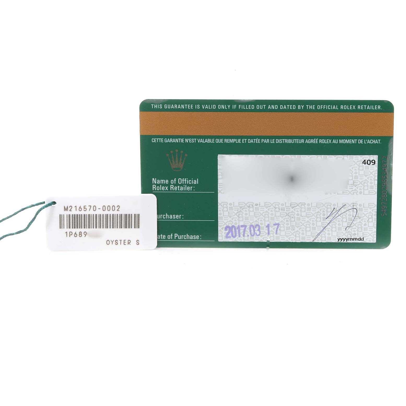 The image shows the warranty card and a tag for a Rolex Explorer 216570 Men
s Stainless Steel Black Dial 216570 Men
s Stainless Steel Black Dial model.