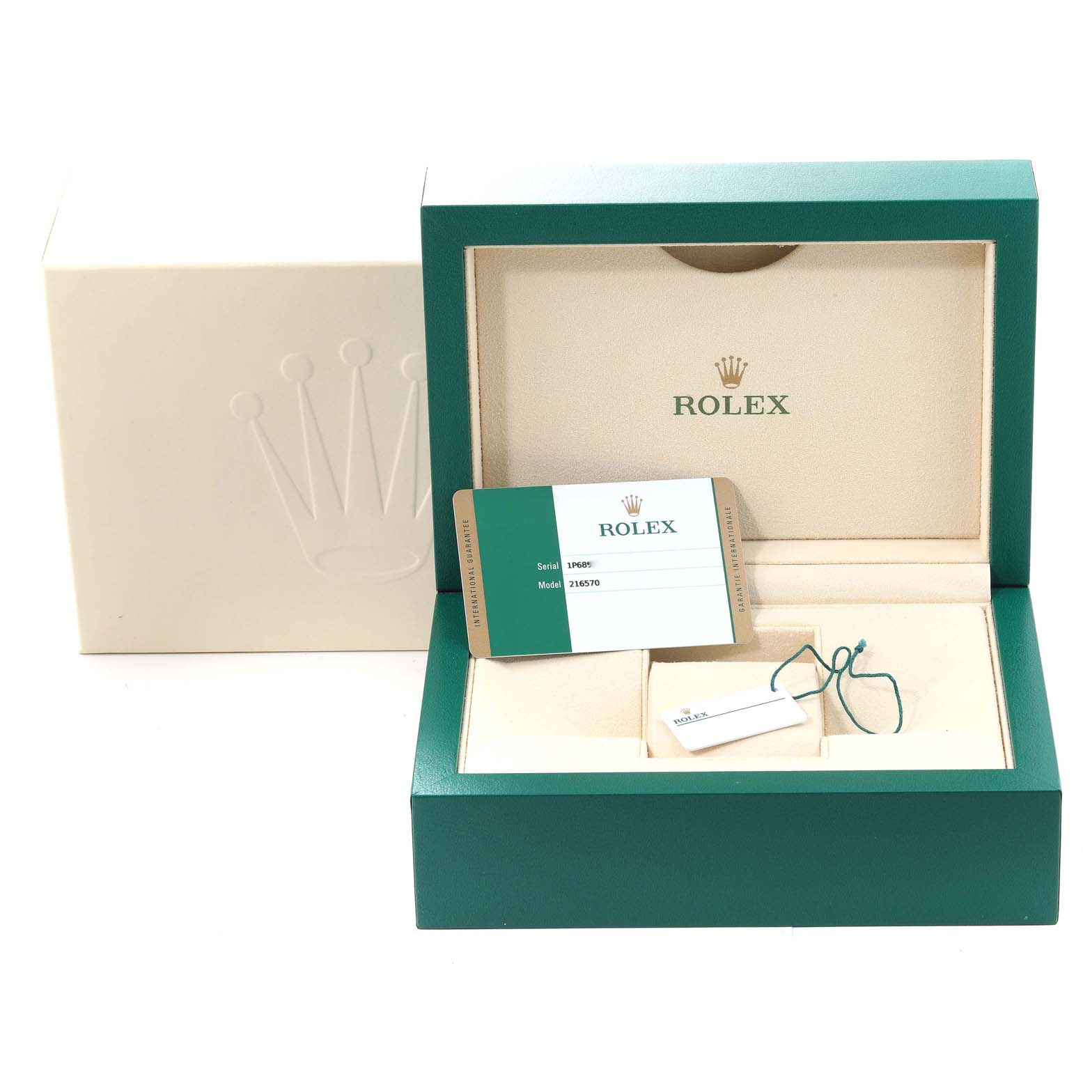 This image shows the open box, warranty card, and tag of a Rolex Explorer 216570 Men
s Stainless Steel Black Dial 216570 Men
s Stainless Steel Black Dial watch.