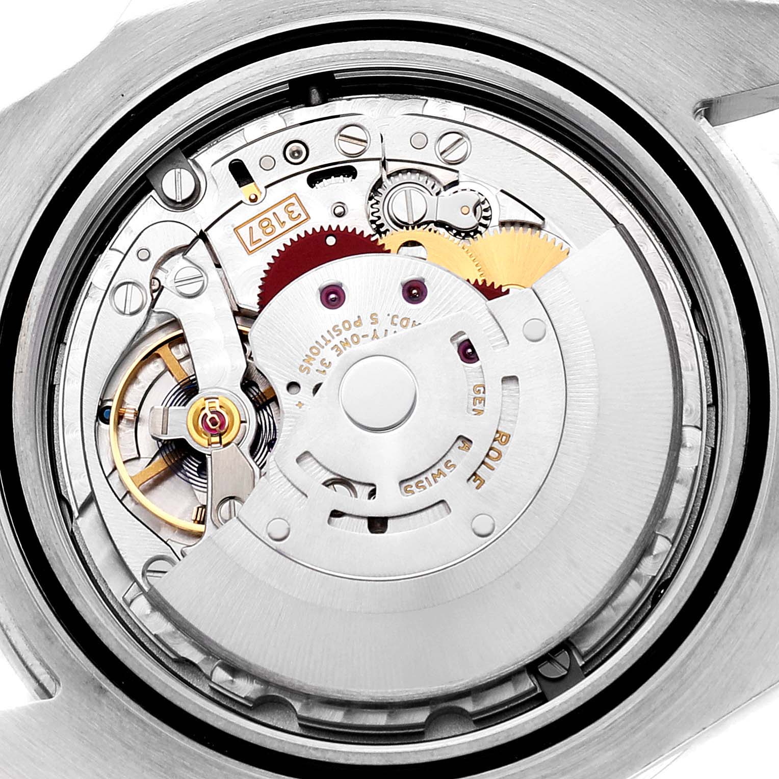 This is a close-up view of the movement mechanism of a Rolex Explorer 216570 Men's Stainless Steel White Dial 216570 Men's Stainless Steel White Dial watch, showing intricate gears and components.