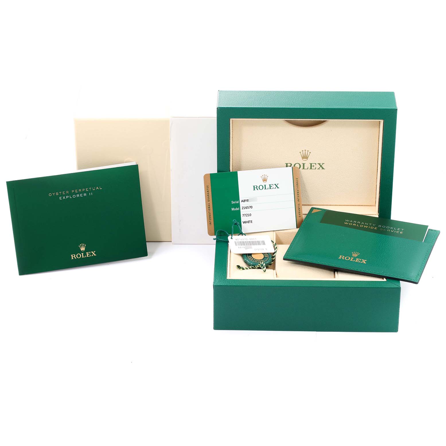 The image shows the packaging and accessories for a Rolex Explorer 216570 Men's Stainless Steel White Dial 216570 Men's Stainless Steel White Dial watch, including the box, manual, warranty card, and tag.