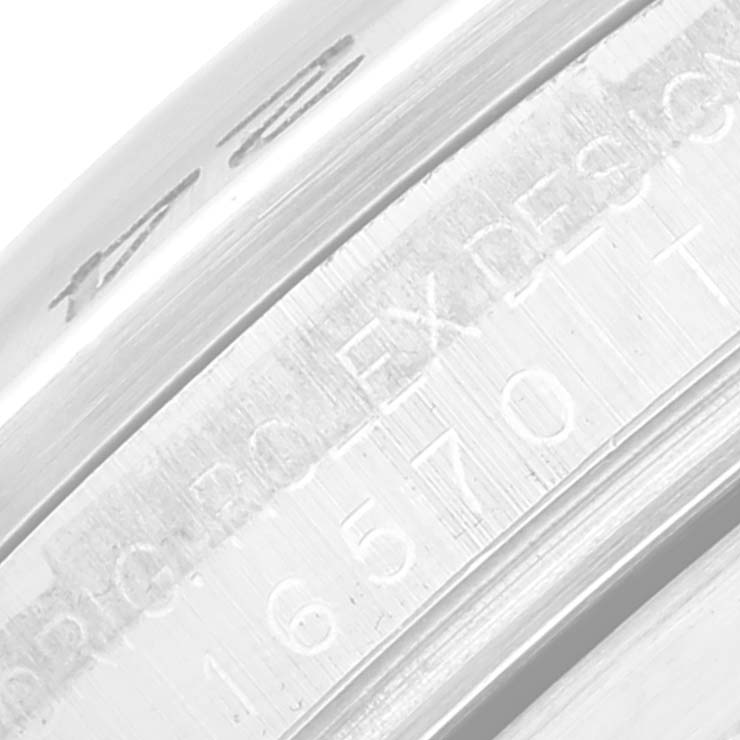 This close-up image shows the model number engraving on the inner bezel (rehaut) of a Rolex Explorer 16570 Men
s Stainless Steel Black Dial 16570 Men
s Stainless Steel Black Dial watch.