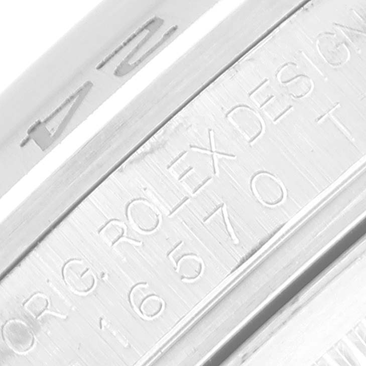 The image shows a close-up of the case engraving inside a Rolex Explorer 16570 Men's Stainless Steel Black Dial 16570 Men's Stainless Steel Black Dial watch.