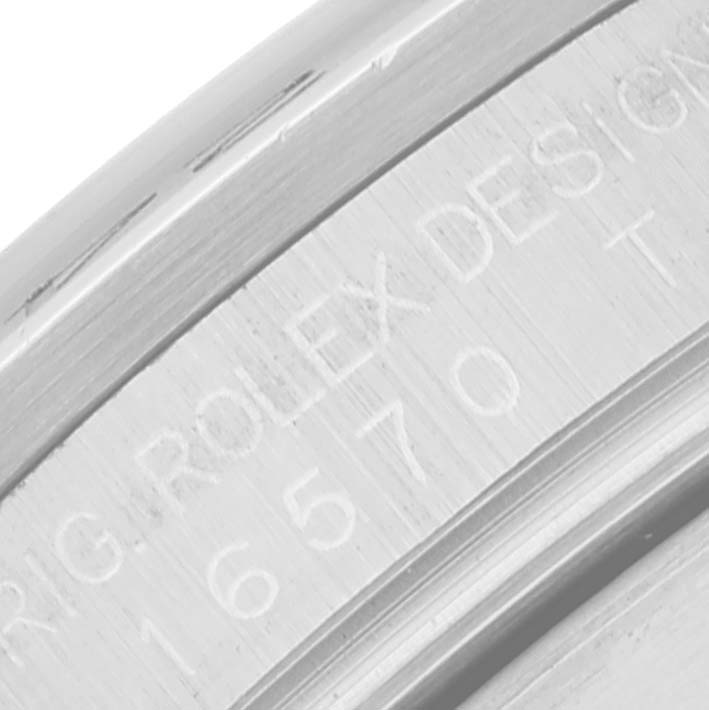 Close-up view of the engraved bezel of the Rolex Explorer 16570 Men's Stainless Steel Black Dial 16570 Men's Stainless Steel Black Dial watch model 16570.