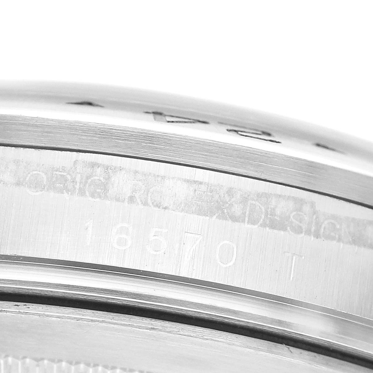 The image shows a close-up of the side of the Rolex Explorer 16570 Men's Stainless Steel Black Dial, focusing on the engraved model number 16570 on the case.