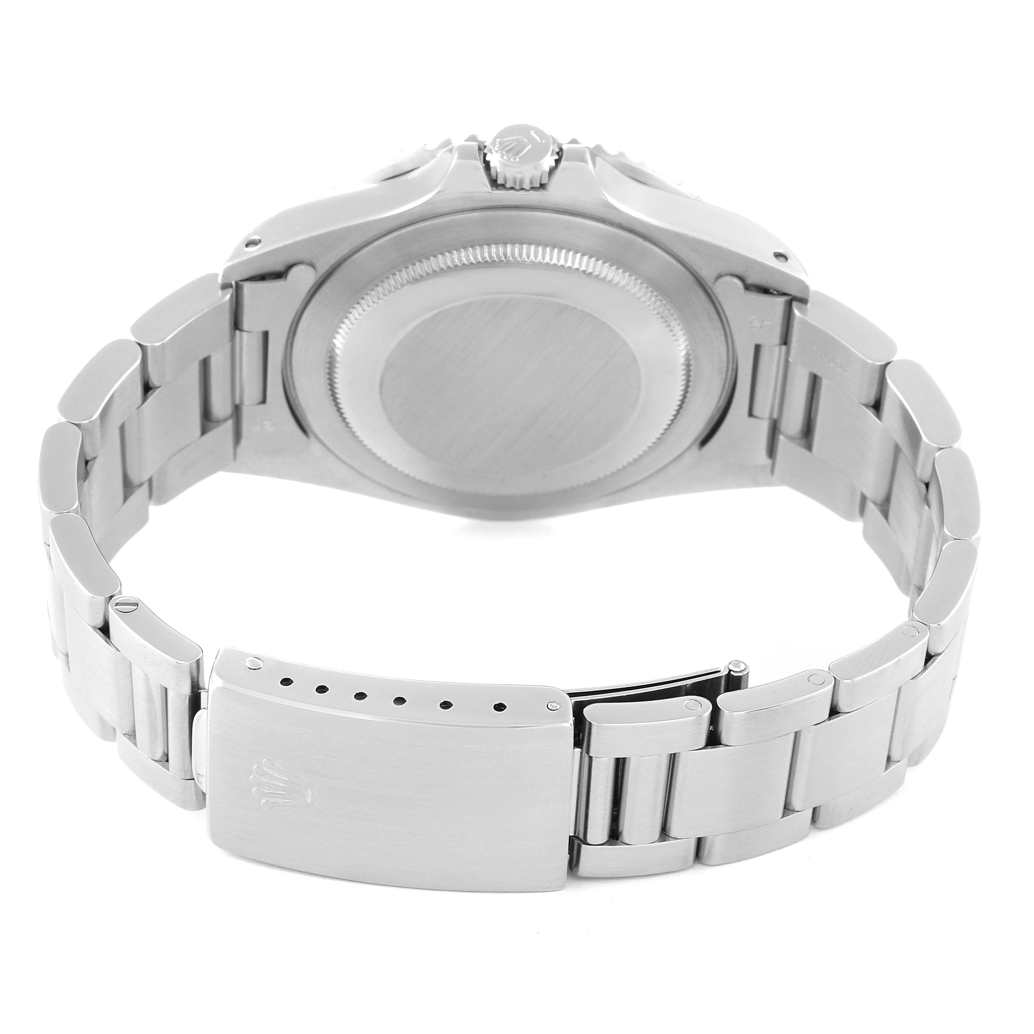 The image shows the back view of a Rolex GMT-Master 16700 Men's Stainless Steel Black Dial 16700 Men's Stainless Steel Black Dial watch, highlighting the case back and bracelet with the clasp opened.