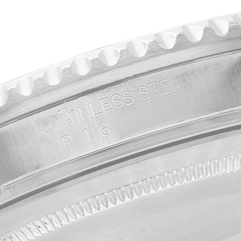 The image shows a close-up of the side and bezel of a Rolex GMT-Master 16710 Men
s Stainless Steel Black Dial 16710 Men
s Stainless Steel Black Dial, highlighting the stainless steel engraving.