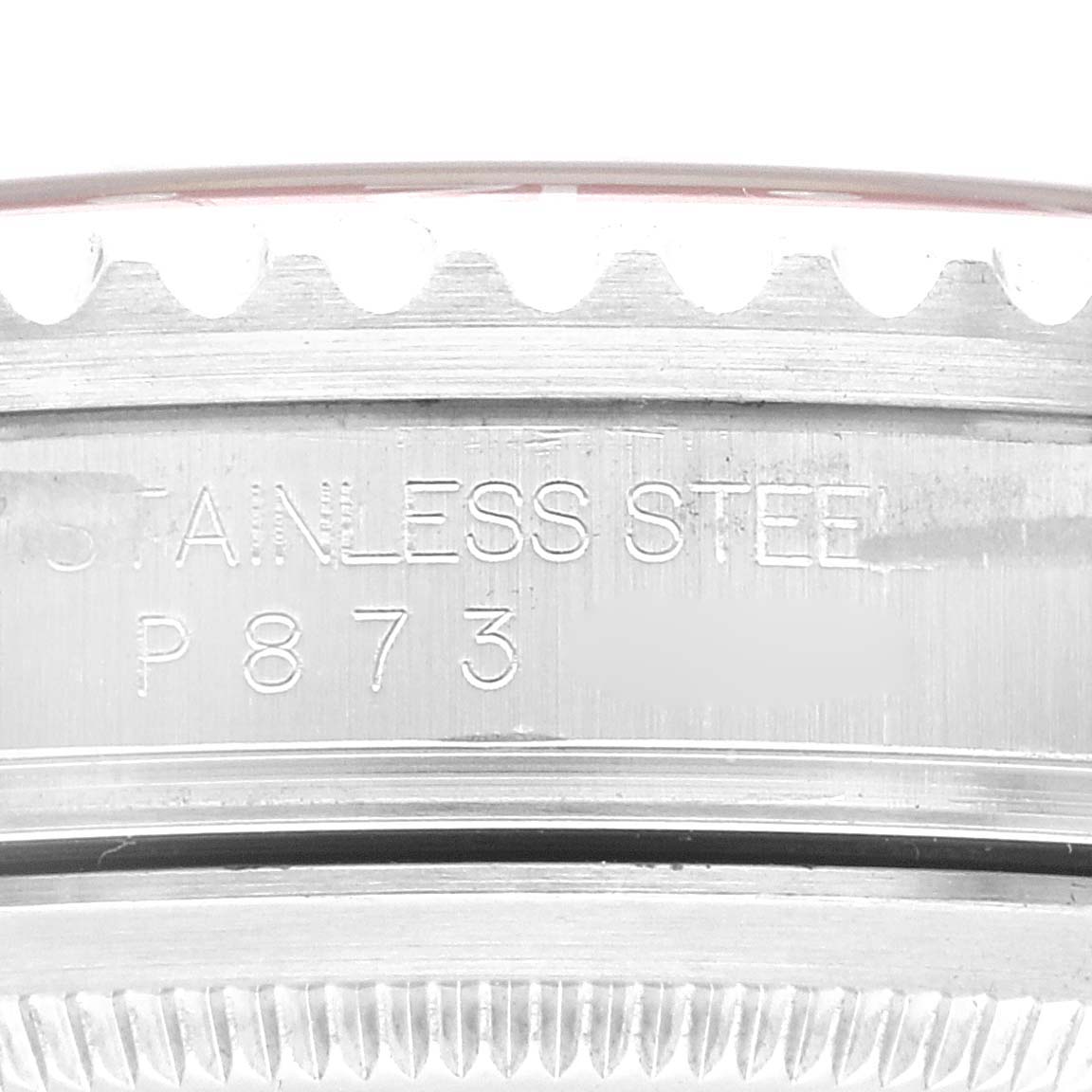 The image shows a close-up of the side of a Rolex GMT-Master 16710 Men's Stainless Steel Black Dial 16710 Men's Stainless Steel Black Dial, highlighting the stainless steel with engraved markings.