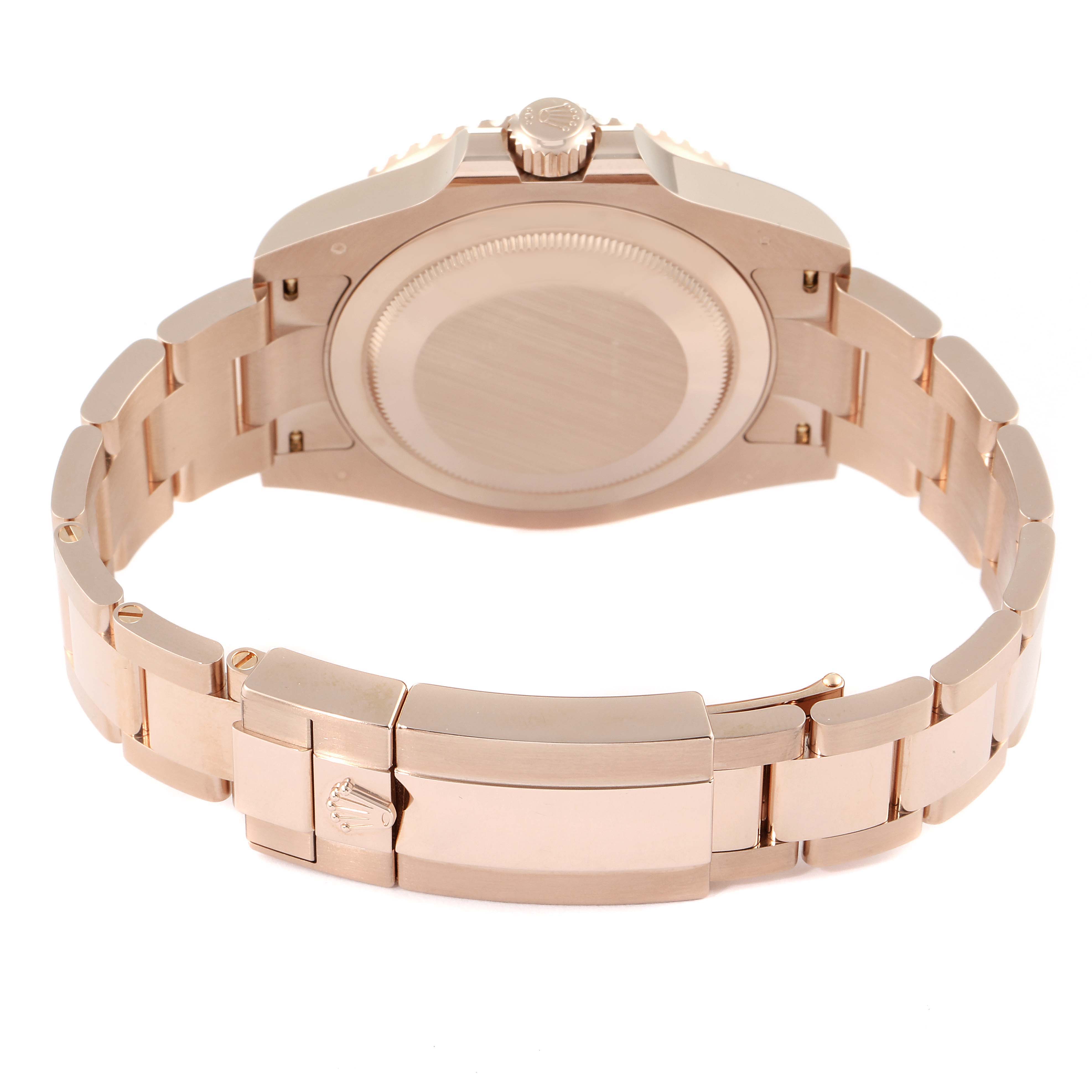 This image shows the rear view of a Rolex GMT-Master 126715 Men's Rose Gold Black Dial 126715 Men's Rose Gold Black Dial watch, highlighting its clasp, bracelet, and case back.