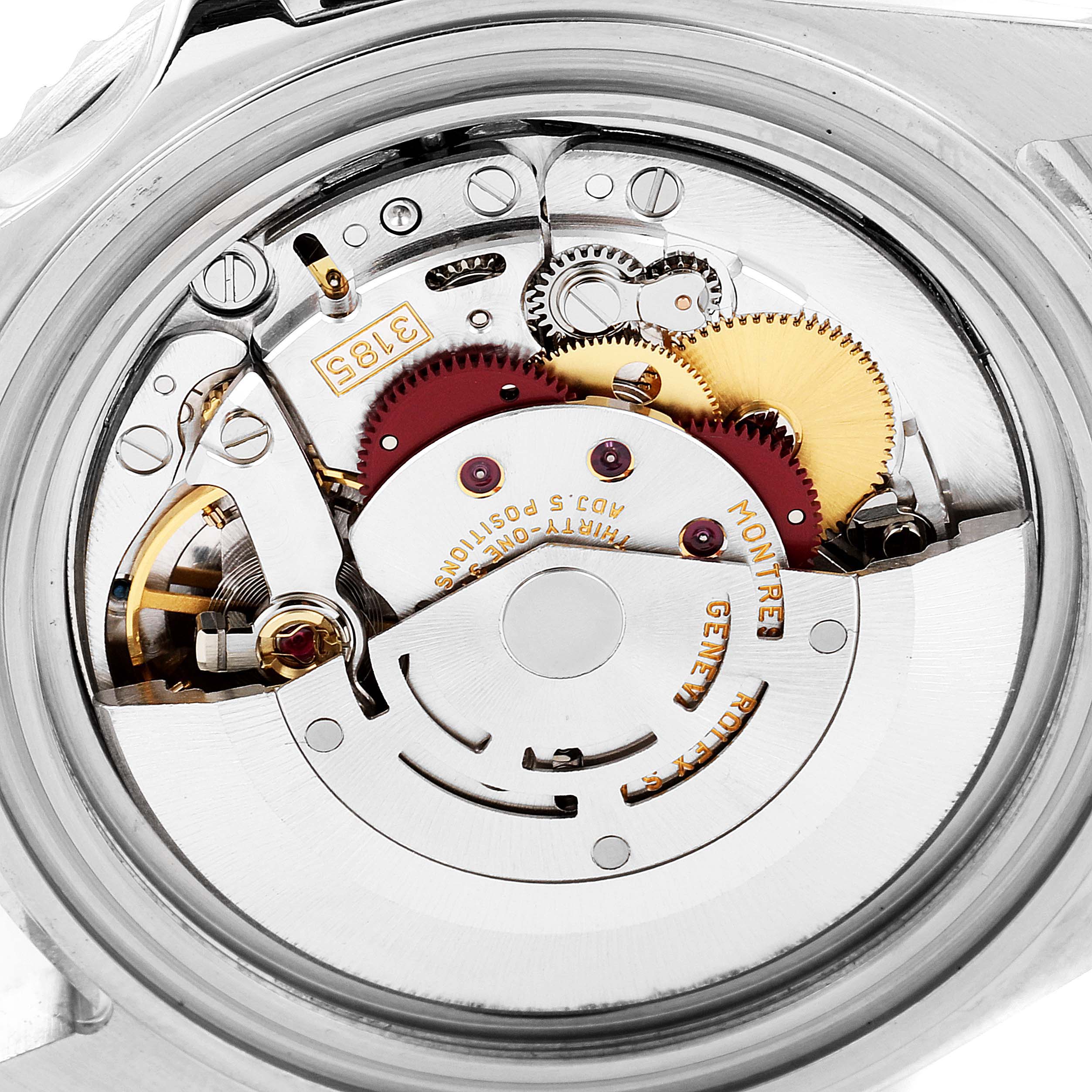 This image shows the intricate internal mechanism and movement of a Rolex GMT-Master 16710 Men
s Stainless Steel Black Dial 16710 Men
s Stainless Steel Black Dial watch from a rear, open-back angle.