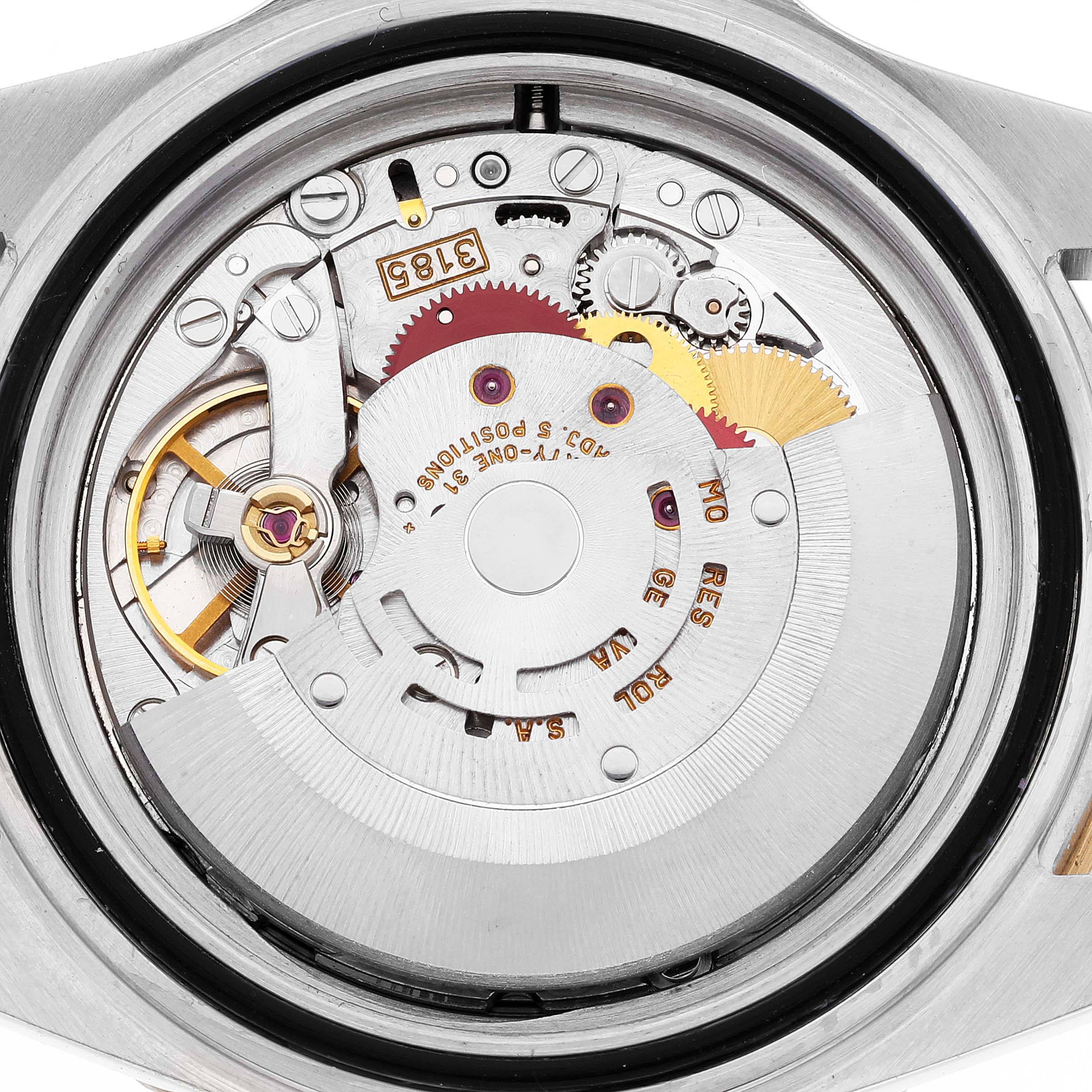 This image shows the internal mechanics and movement of a Rolex GMT-Master 16713 Men's Stainless Steel Brown Dial 16713 Men's Stainless Steel Brown Dial watch from a top-down angle.