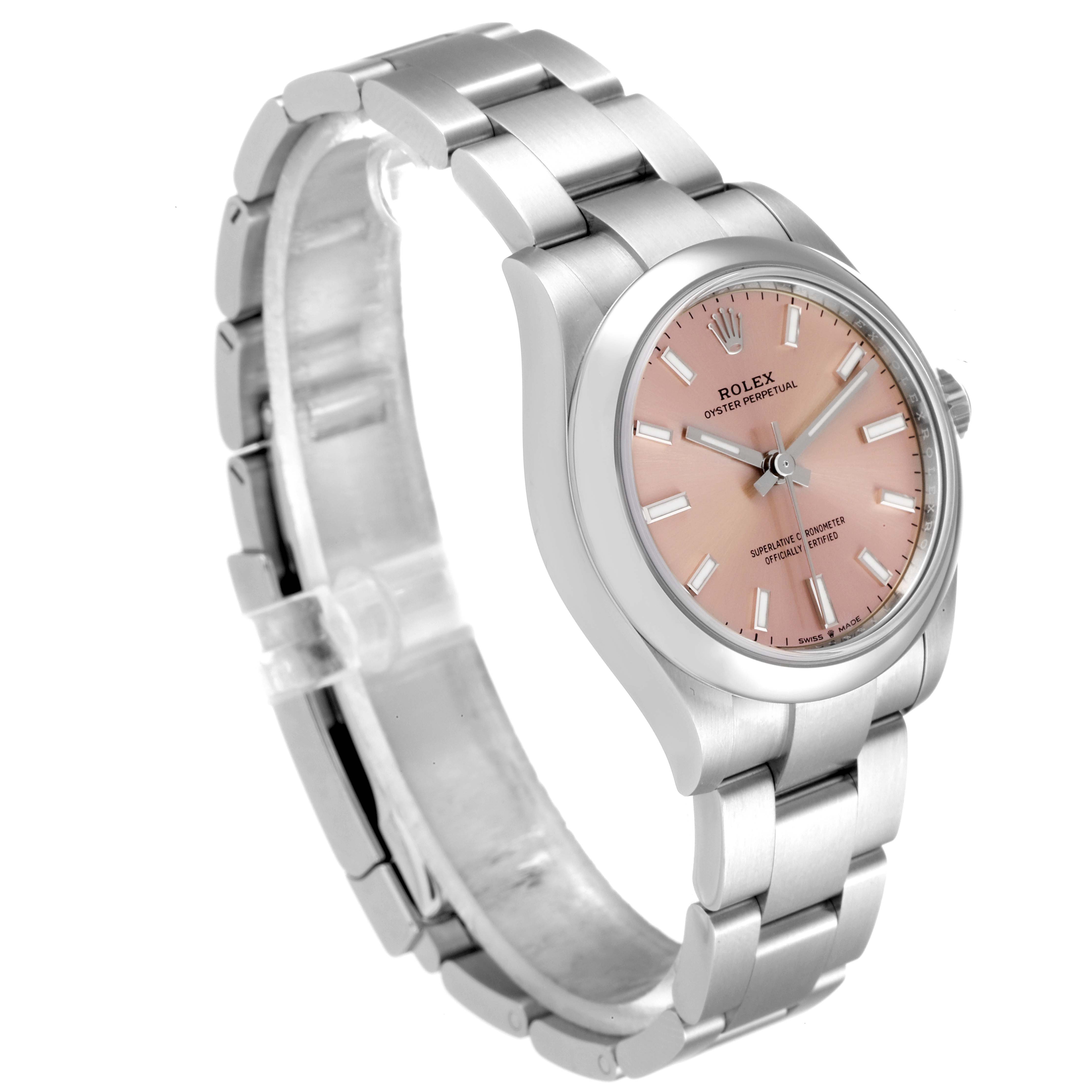 The image shows the Rolex Mid-Size 277200 Women's Stainless Steel Pink Dial 277200 Women's Stainless Steel Pink Dial Oyster Perpetual watch at a three-quarter angle, highlighting its pink dial, case, and metal band.