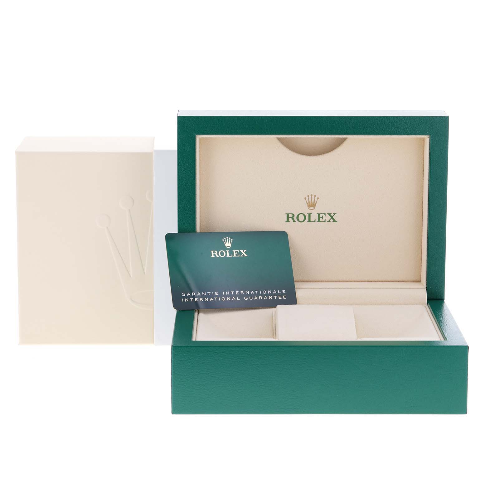 The image shows the watch box and international guarantee card for a mid-size Rolex model, viewed from the front.