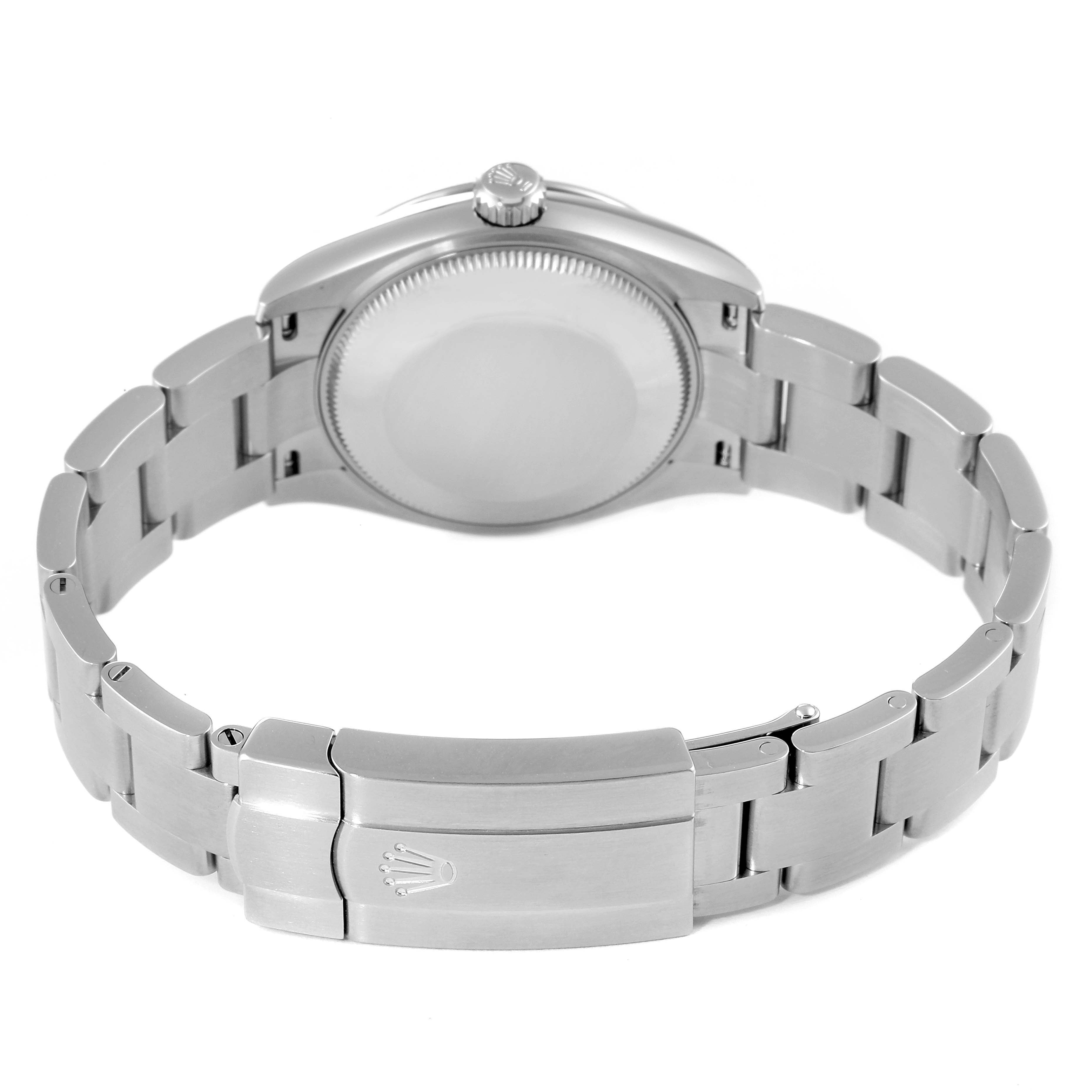 The image shows the back view of a Rolex Mid-Size 277200 Women's Stainless Steel Pink Dial 277200 Women's Stainless Steel Pink Dial model watch, highlighting the clasp and case back.